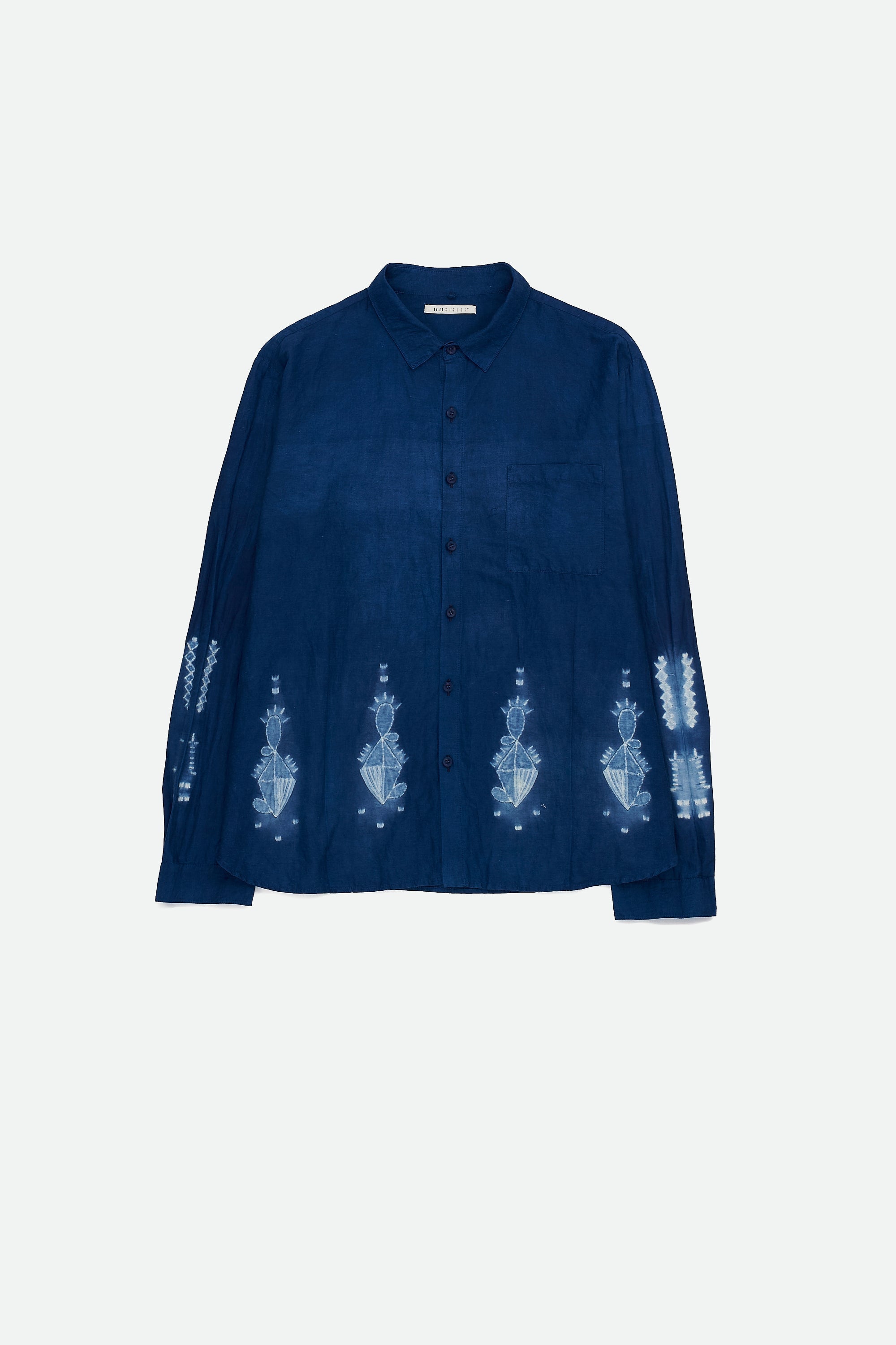 Front image of a medium indigo shirt with shibori