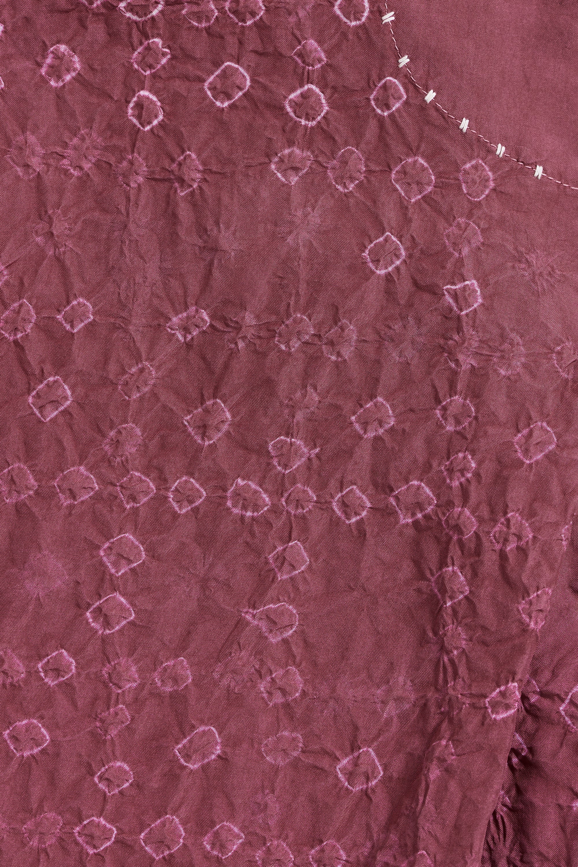 Close-up of a textured purple fabric