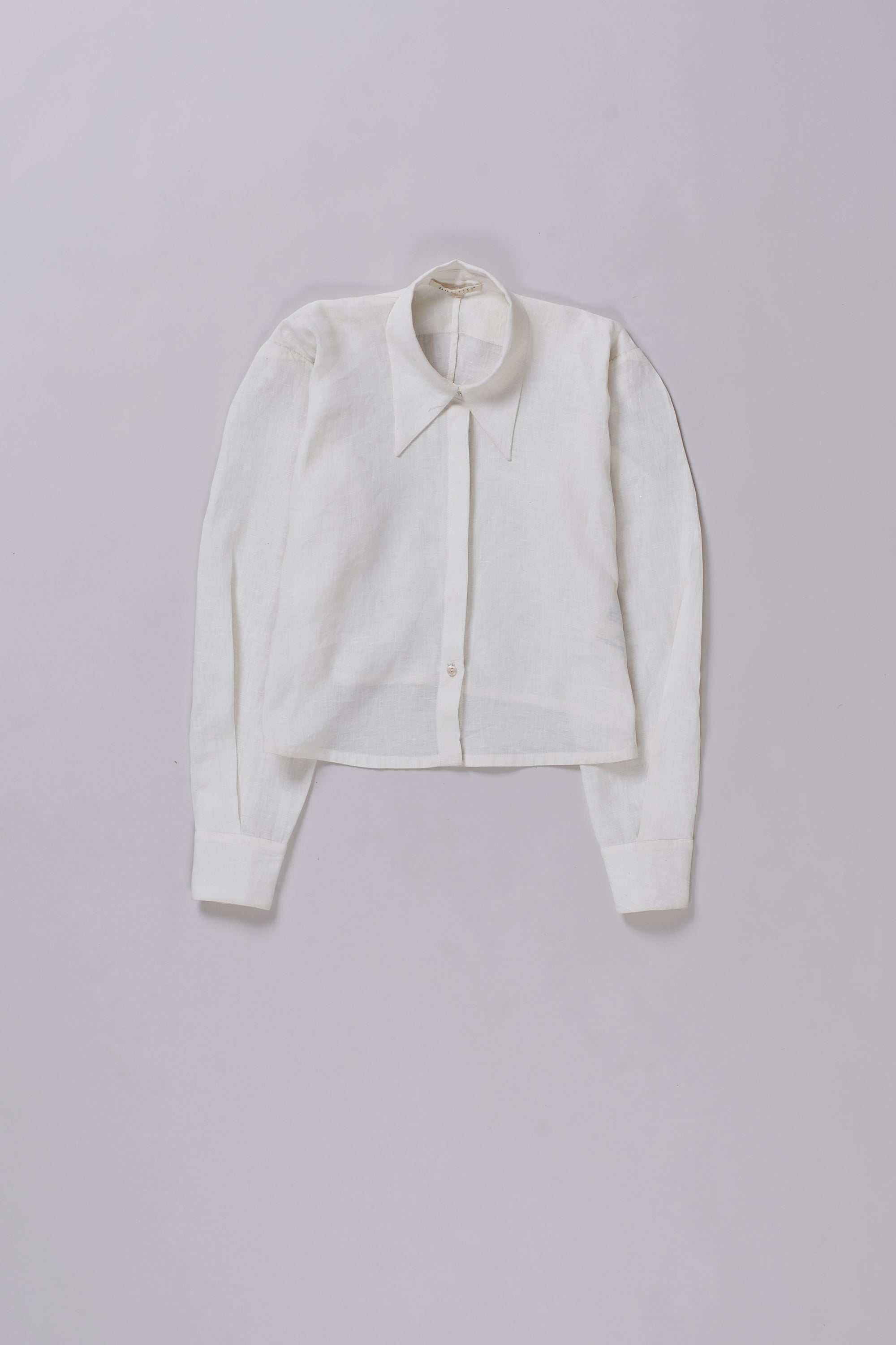Front image of a ecru shirt