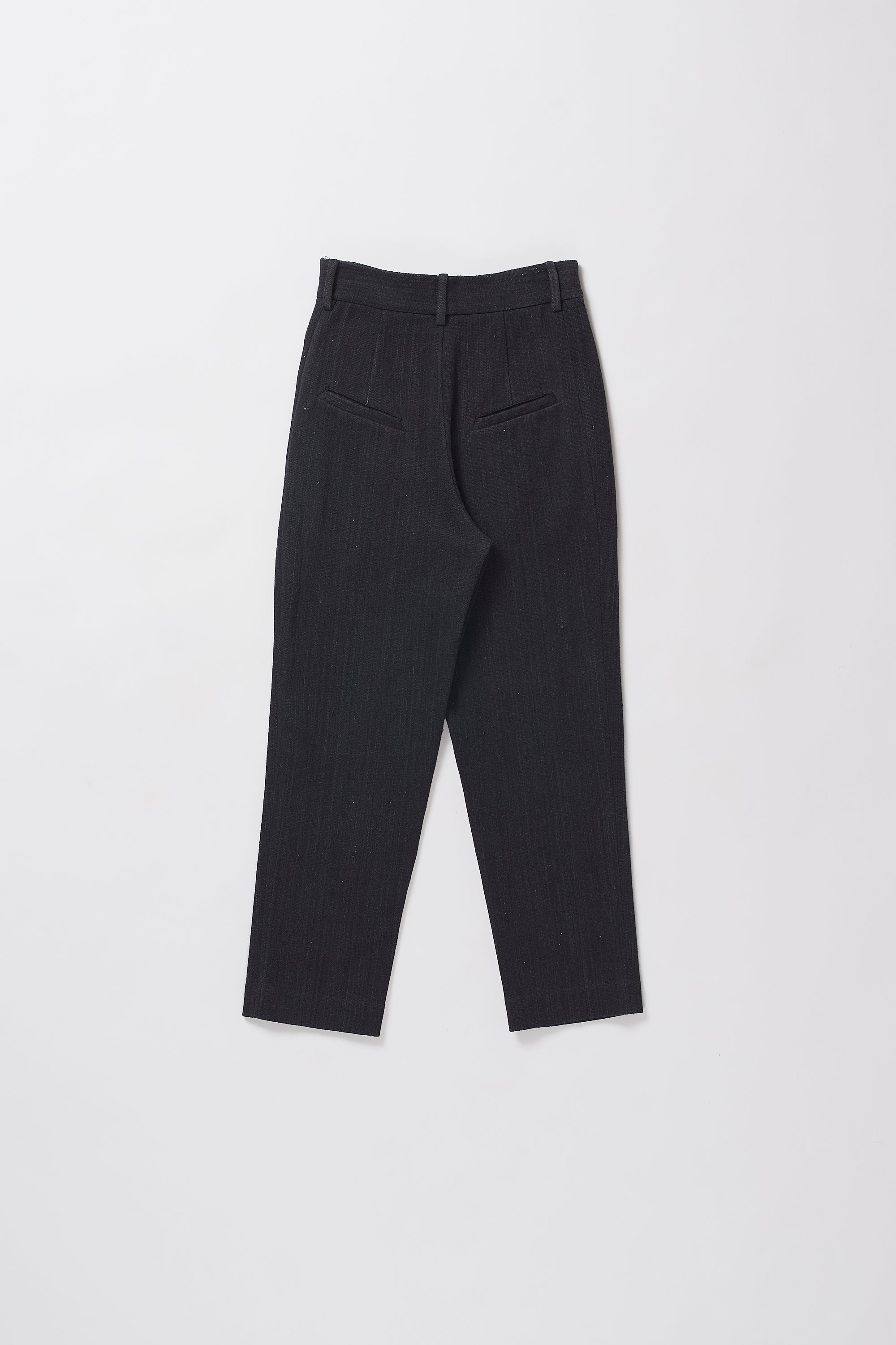 Back image of a midnight indigo pant