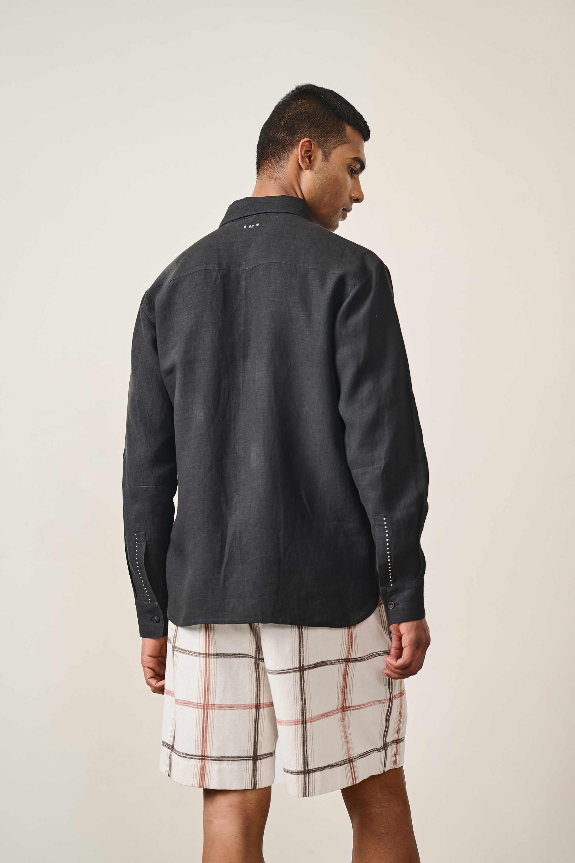 Back image of a black shirt