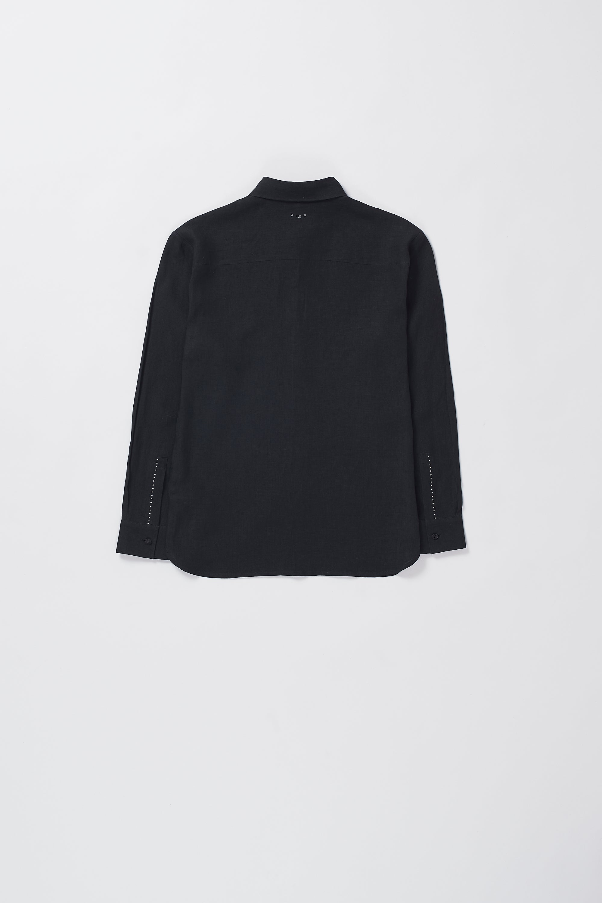 A back shot of a man wearing black shirt