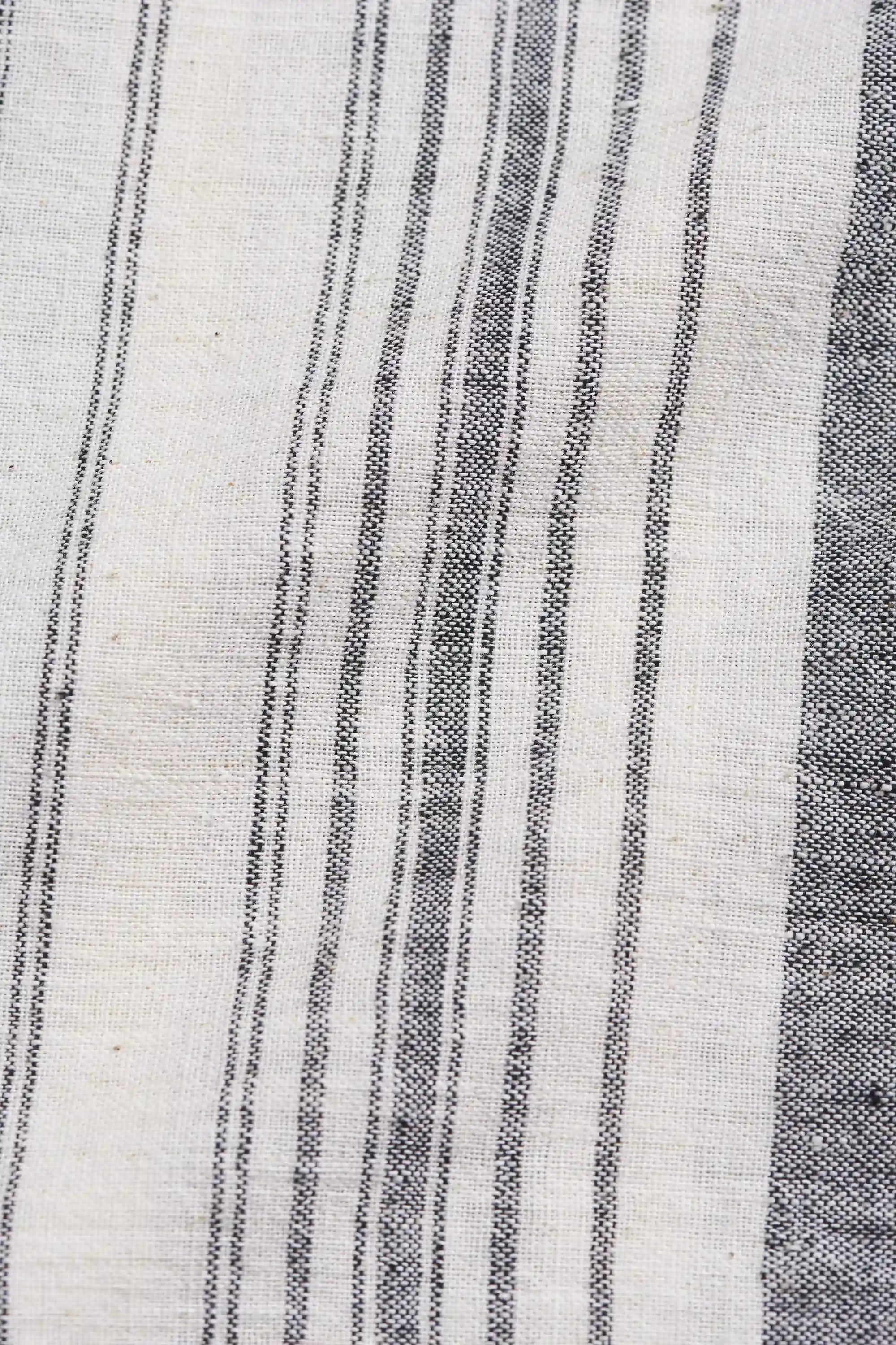 Close-up of fabric with black and white striped pattern