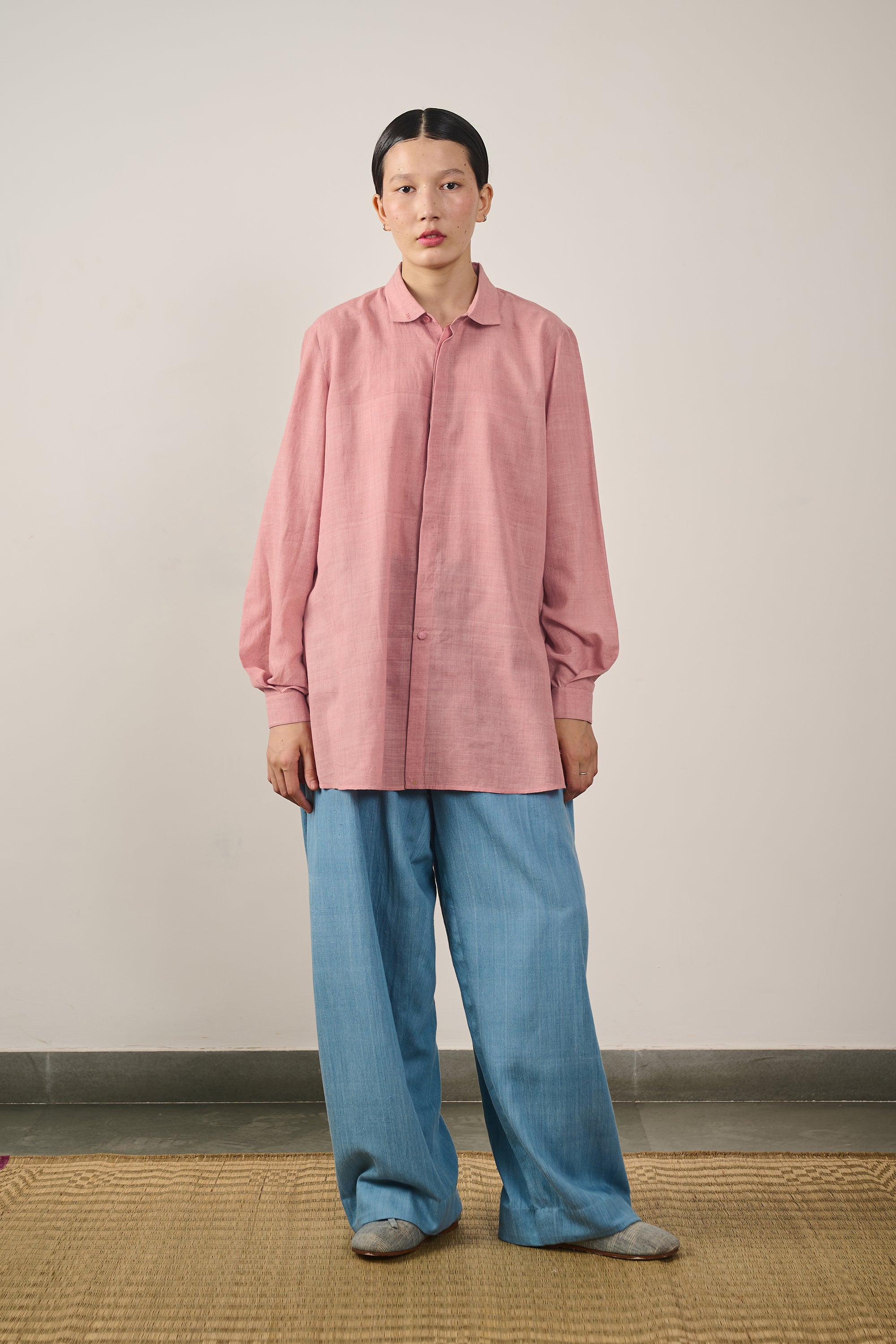 A woman wearing cotton shirt