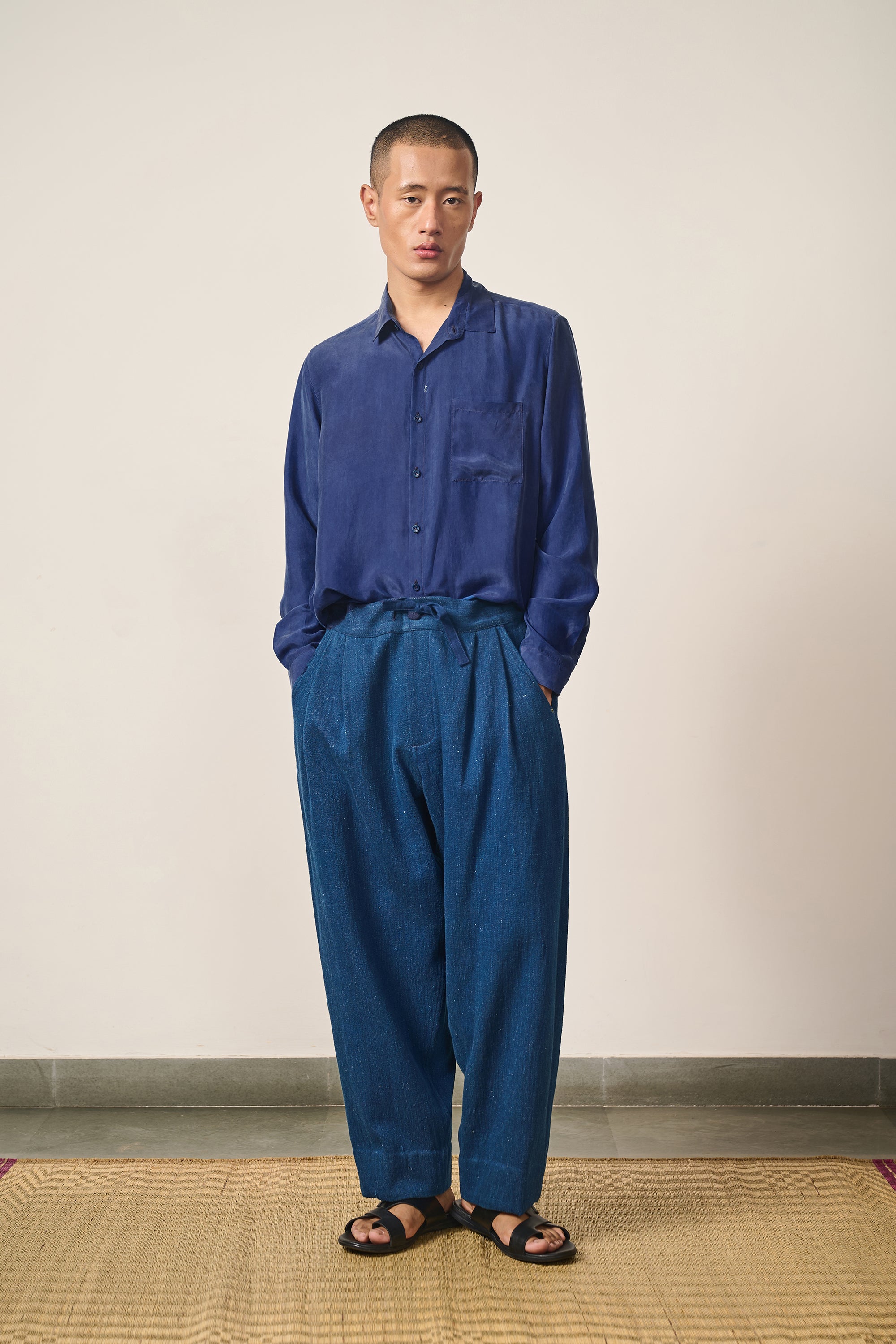 A man wearing silk shirt in medium indigo
