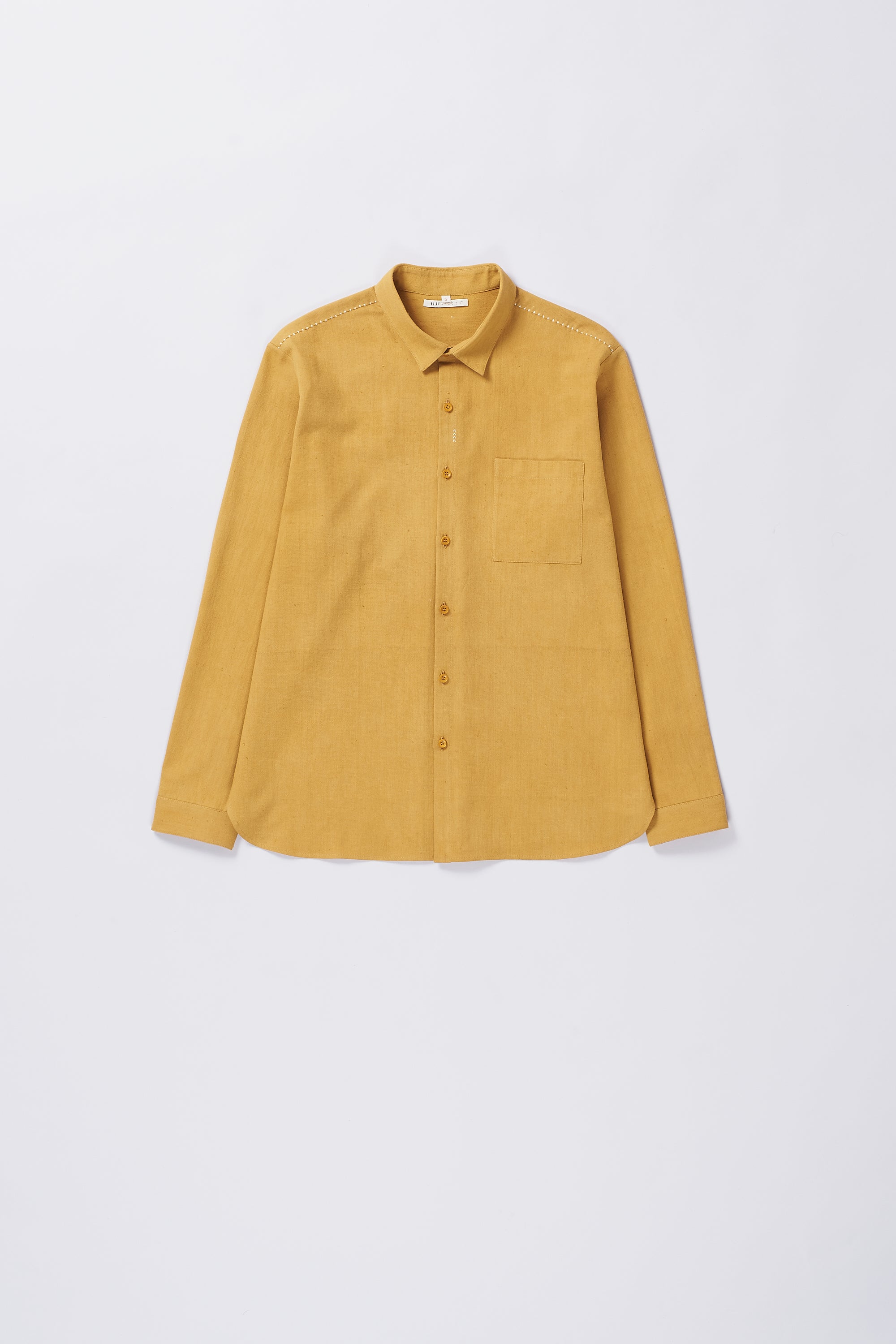 Front image of a mustard yellow shirt