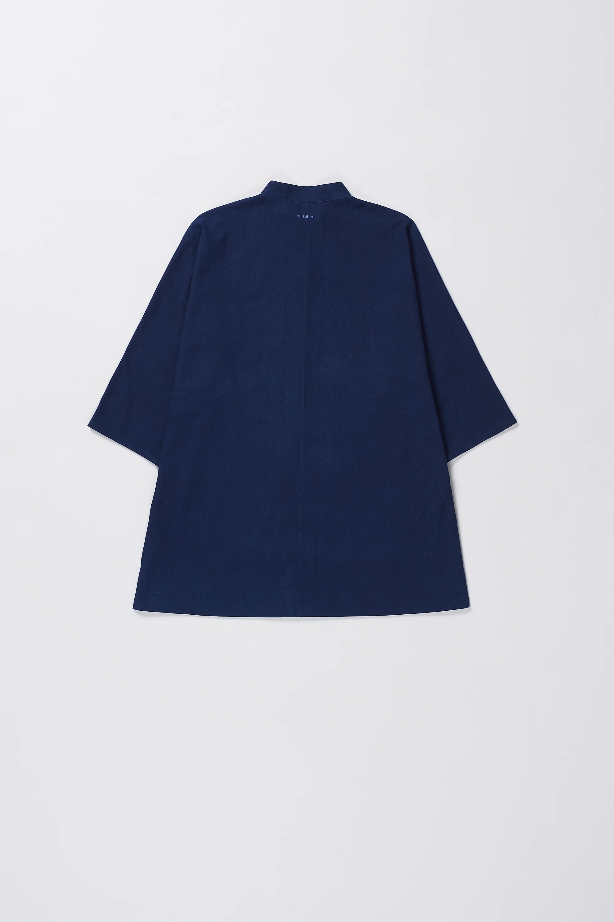Back image of a indigo shirt