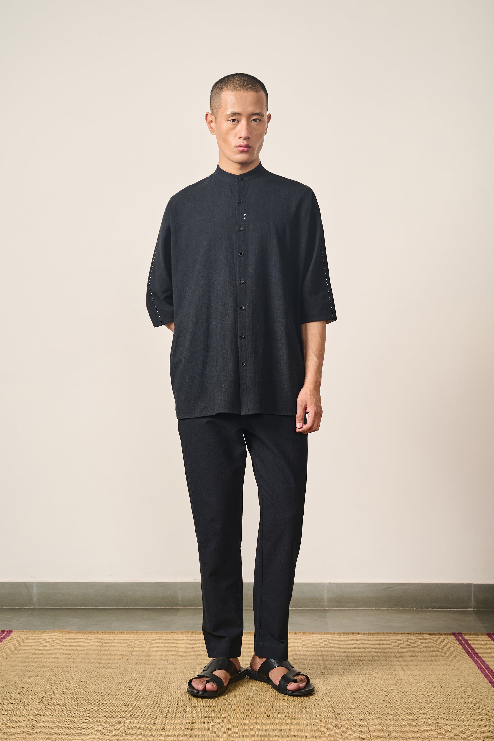 A man wearing cotton shirt in black
