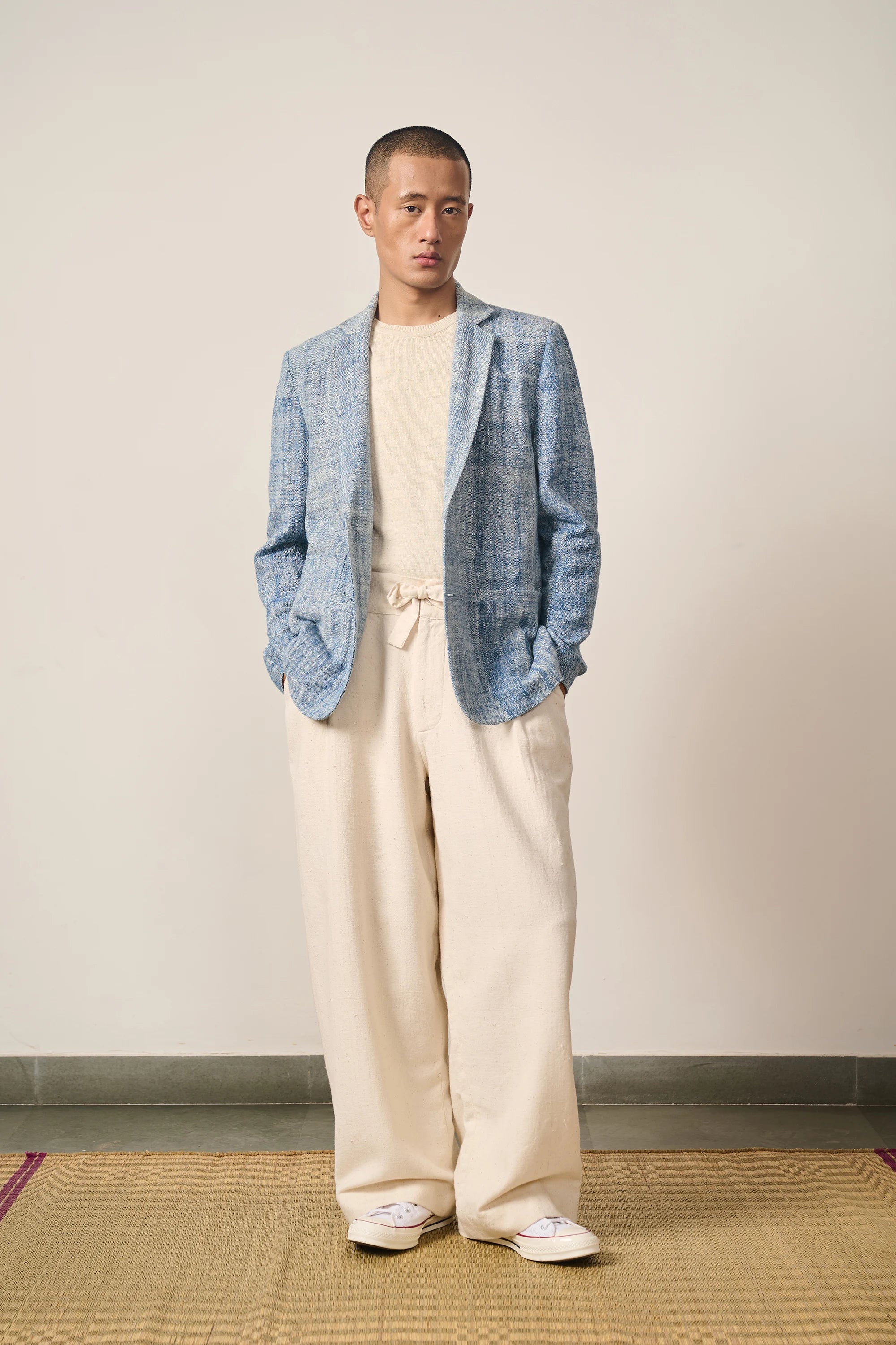 A man wearing indigo cotton jacket
