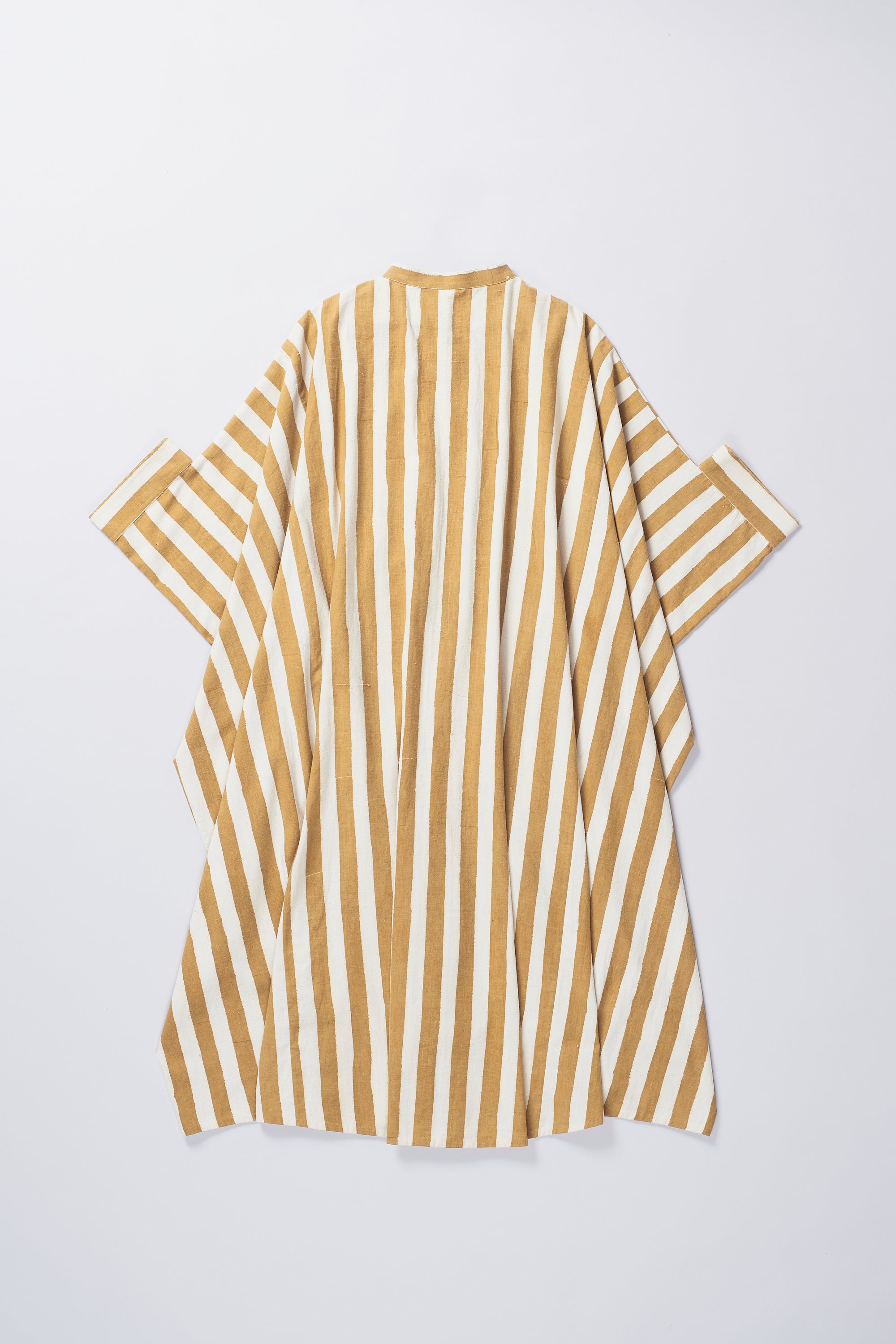 Back image of a mustard yellow kaftan