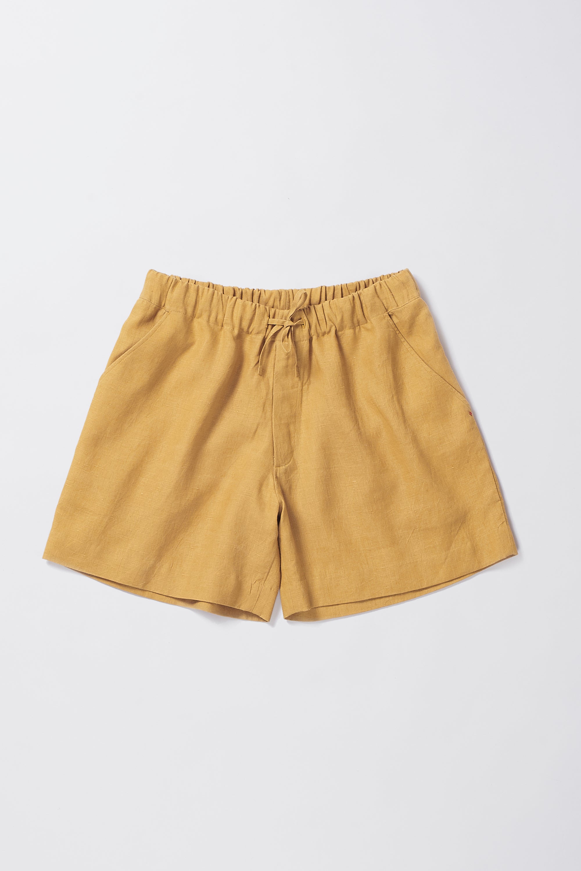 Front image of mustard yellow shorts