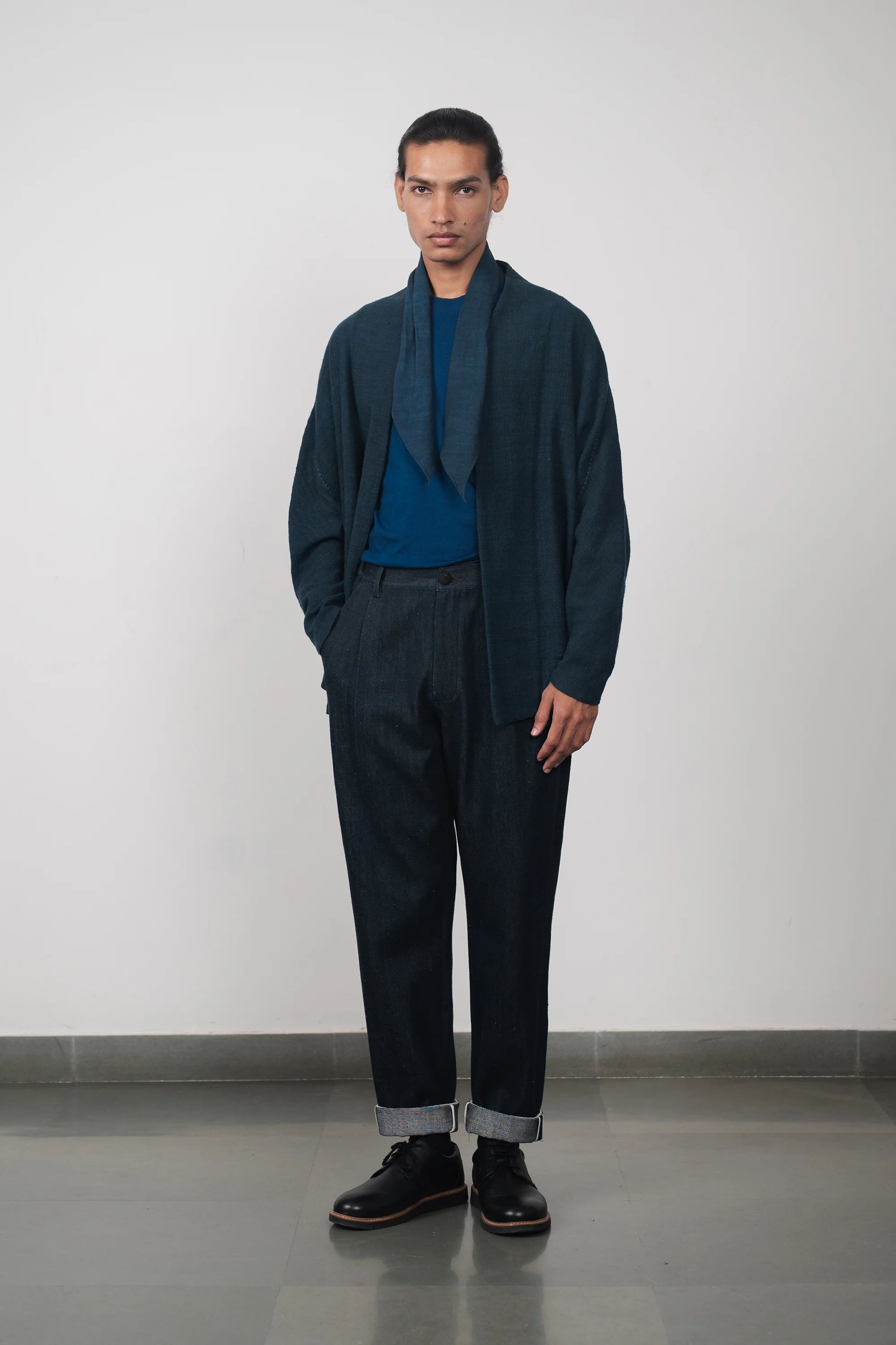 A man wearing midnight indigo denim trouser