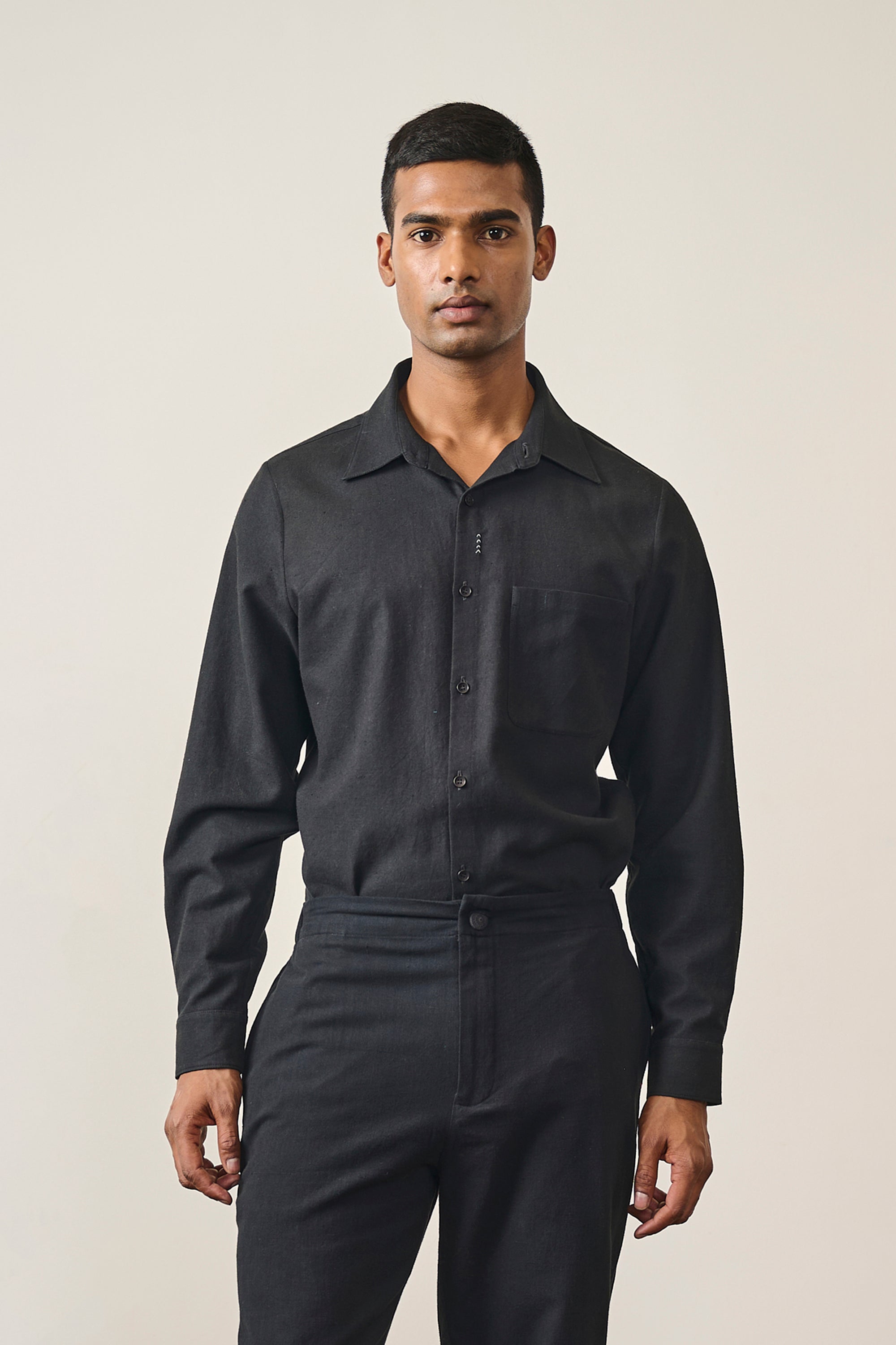 A man wearing black shirt