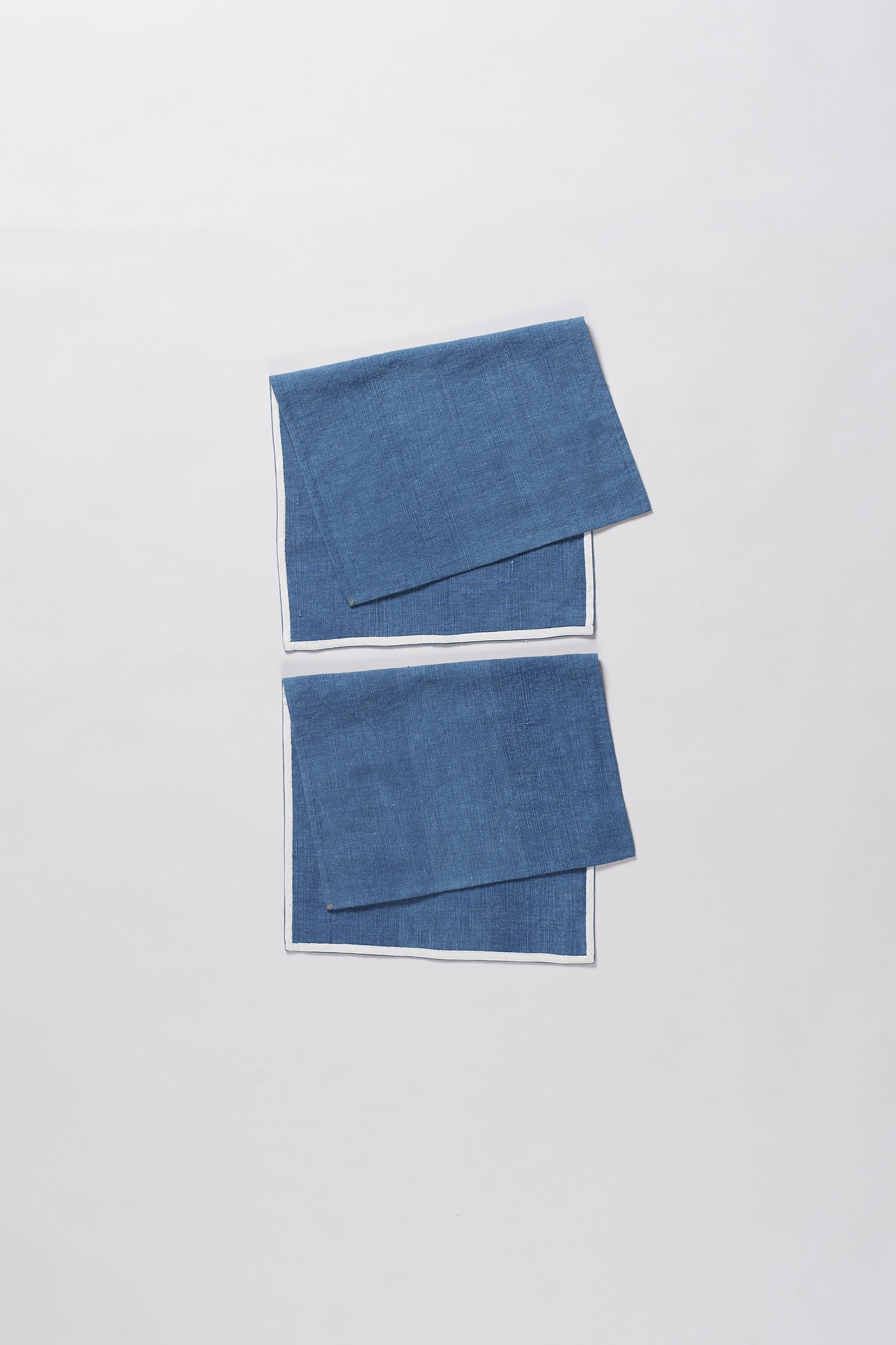 Folded light indigo cotton towel