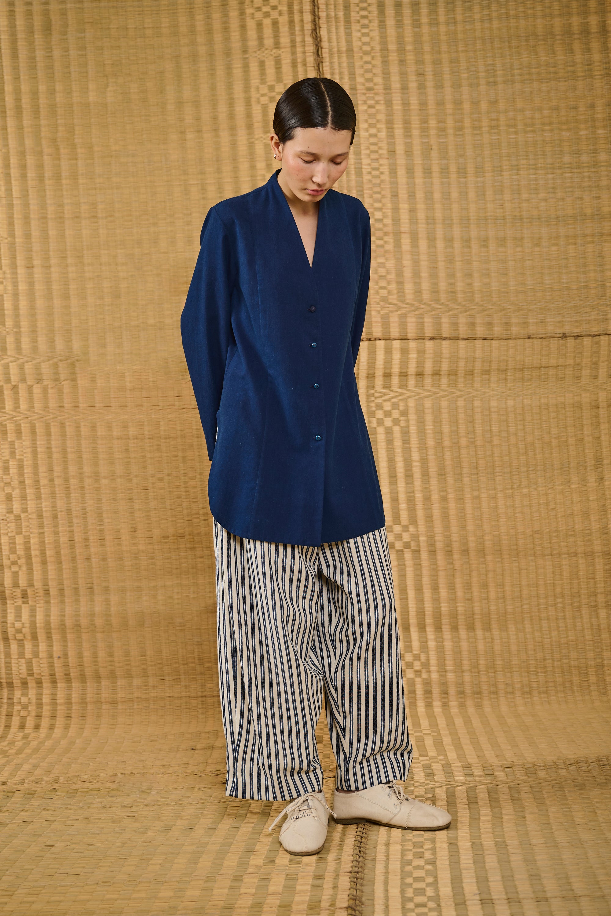 A woman wearing cotton shirt
