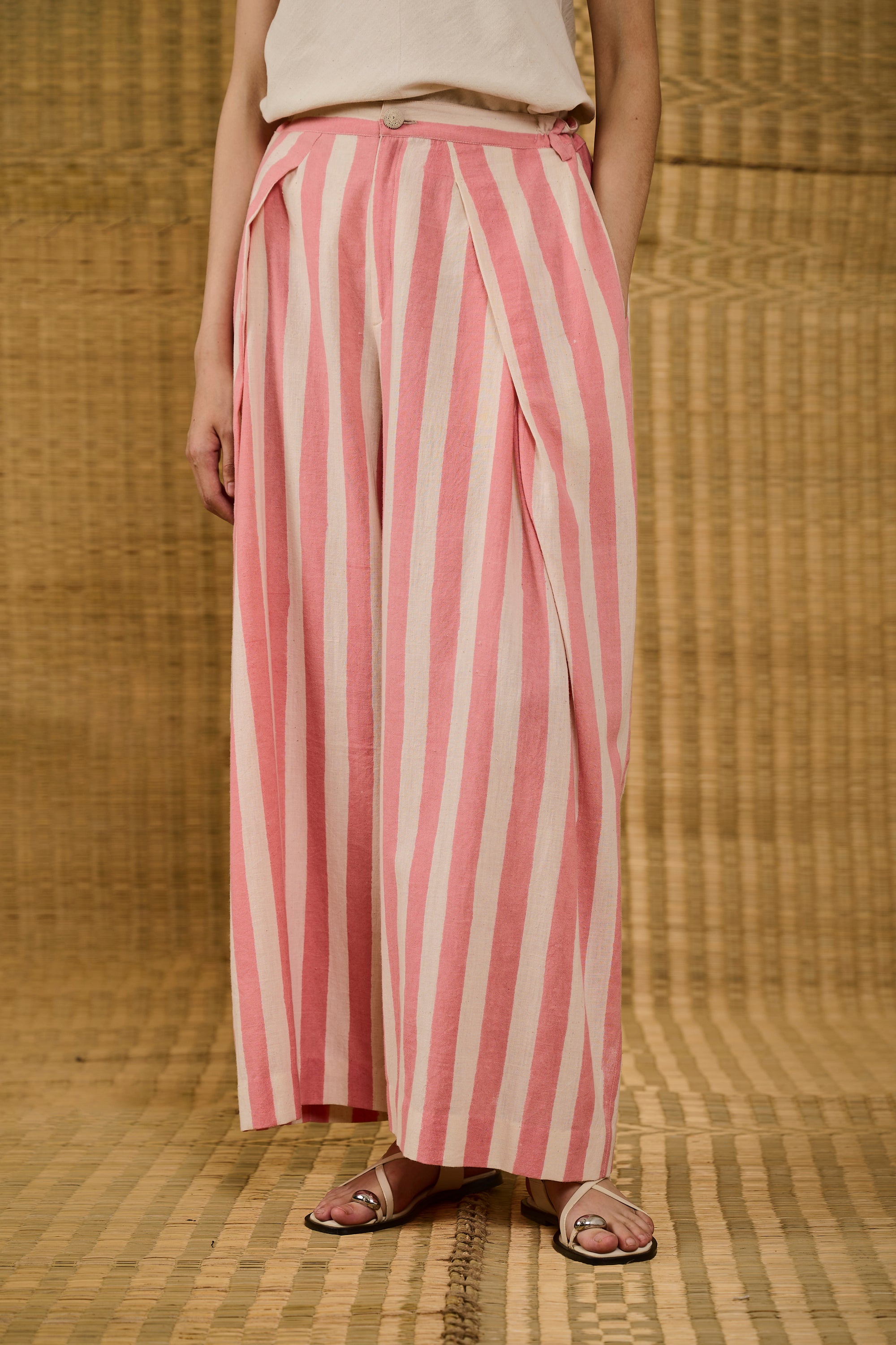 A woman wearing pink wood pant
