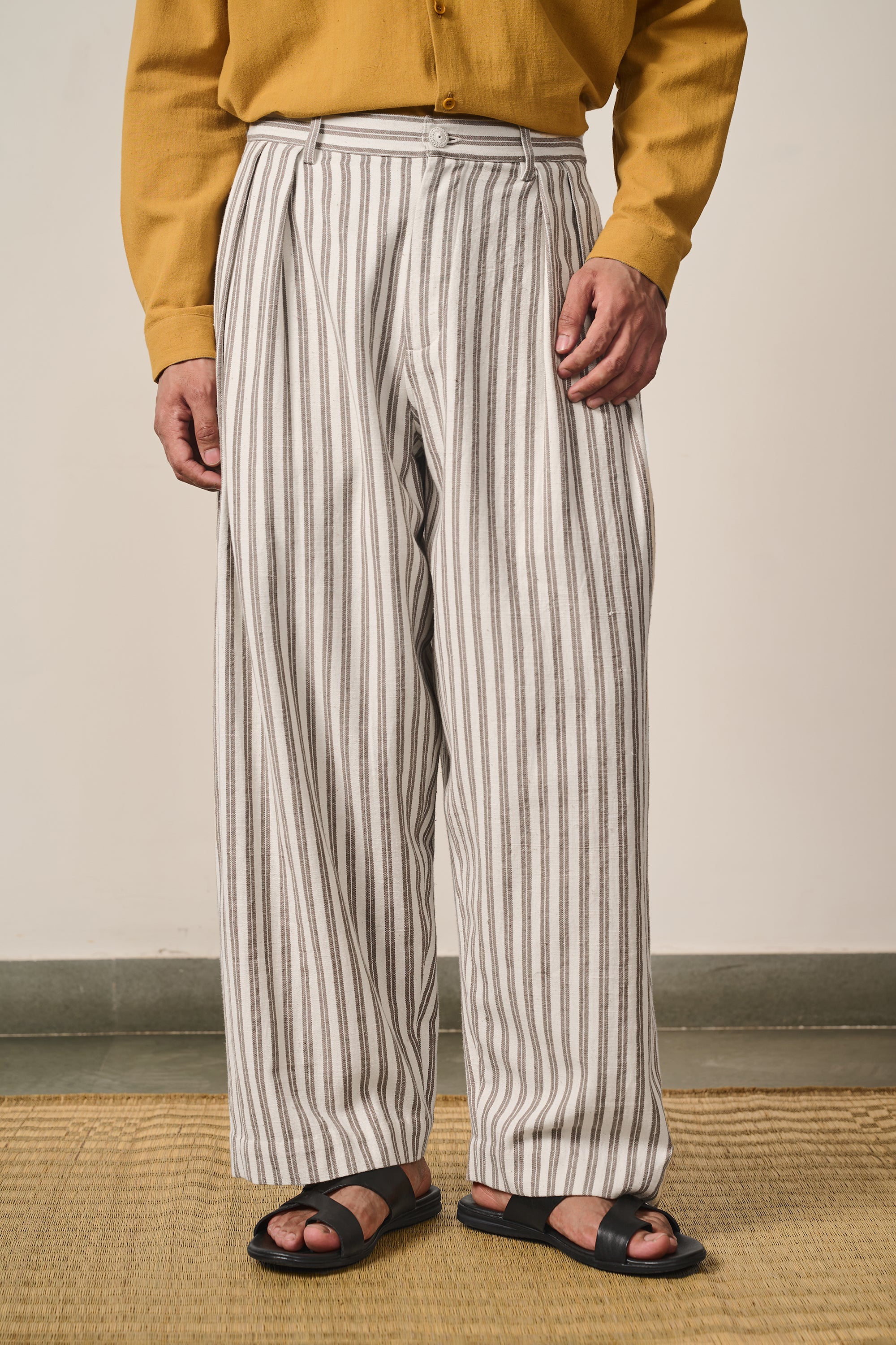 A man wearing charcoal cotton pant