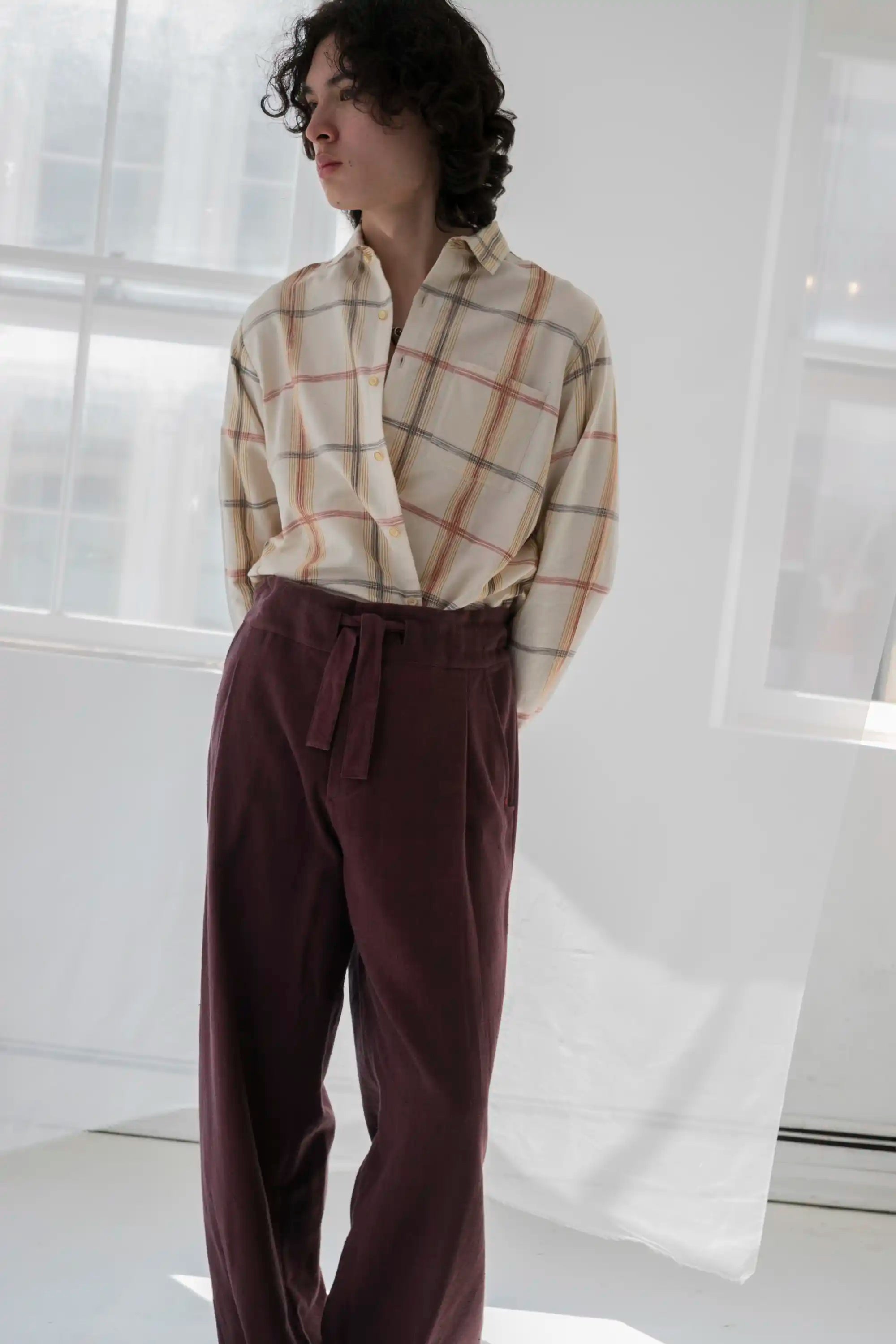 A man wearing cream cotton shirt