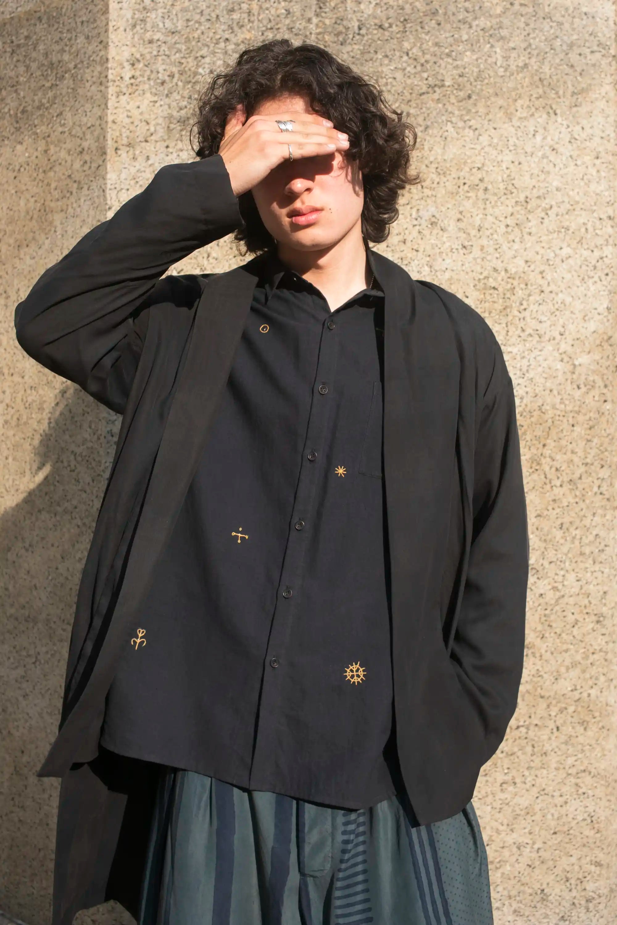 A man wearing black cotton jacket