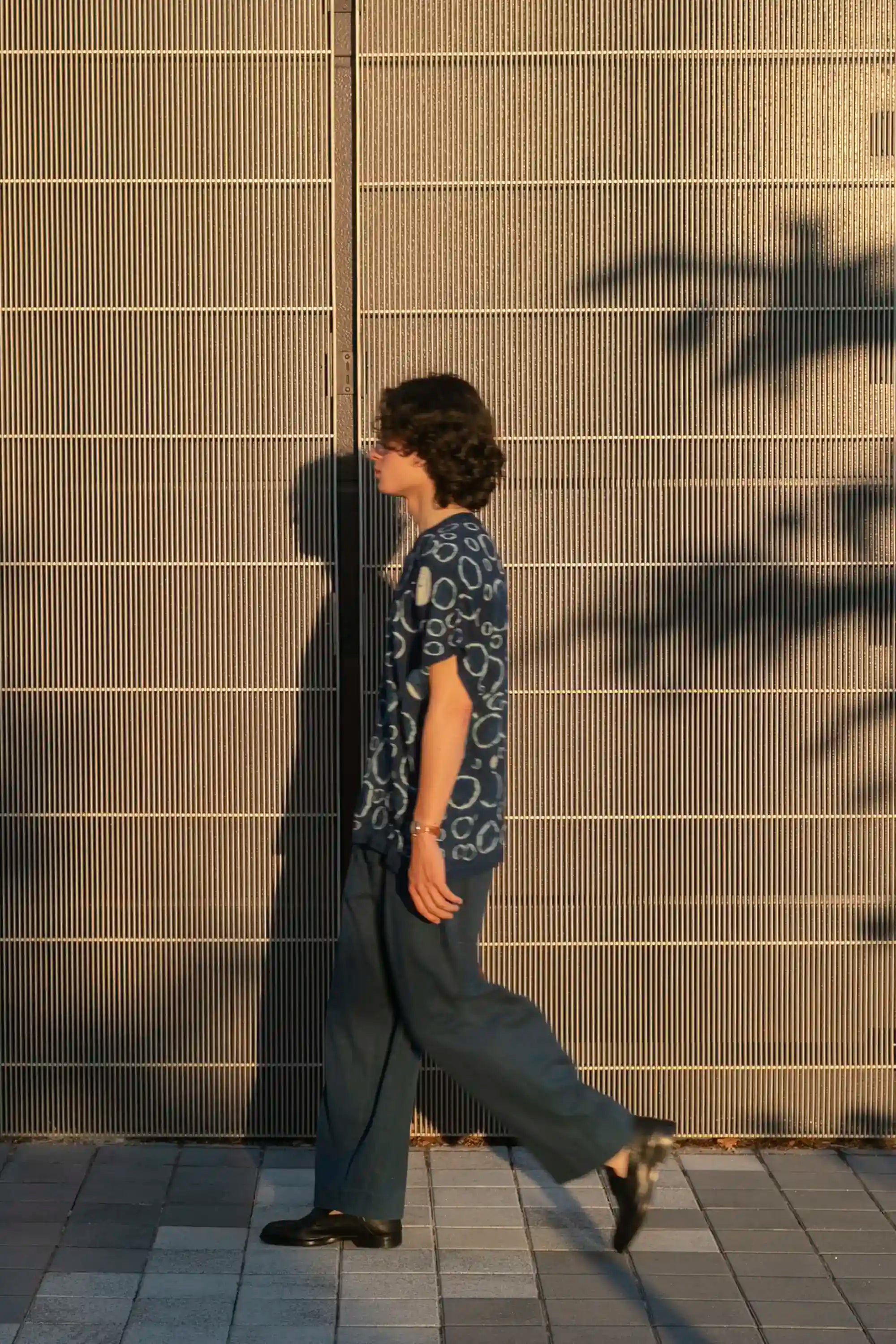 A man wearing estate blue cotton trouser