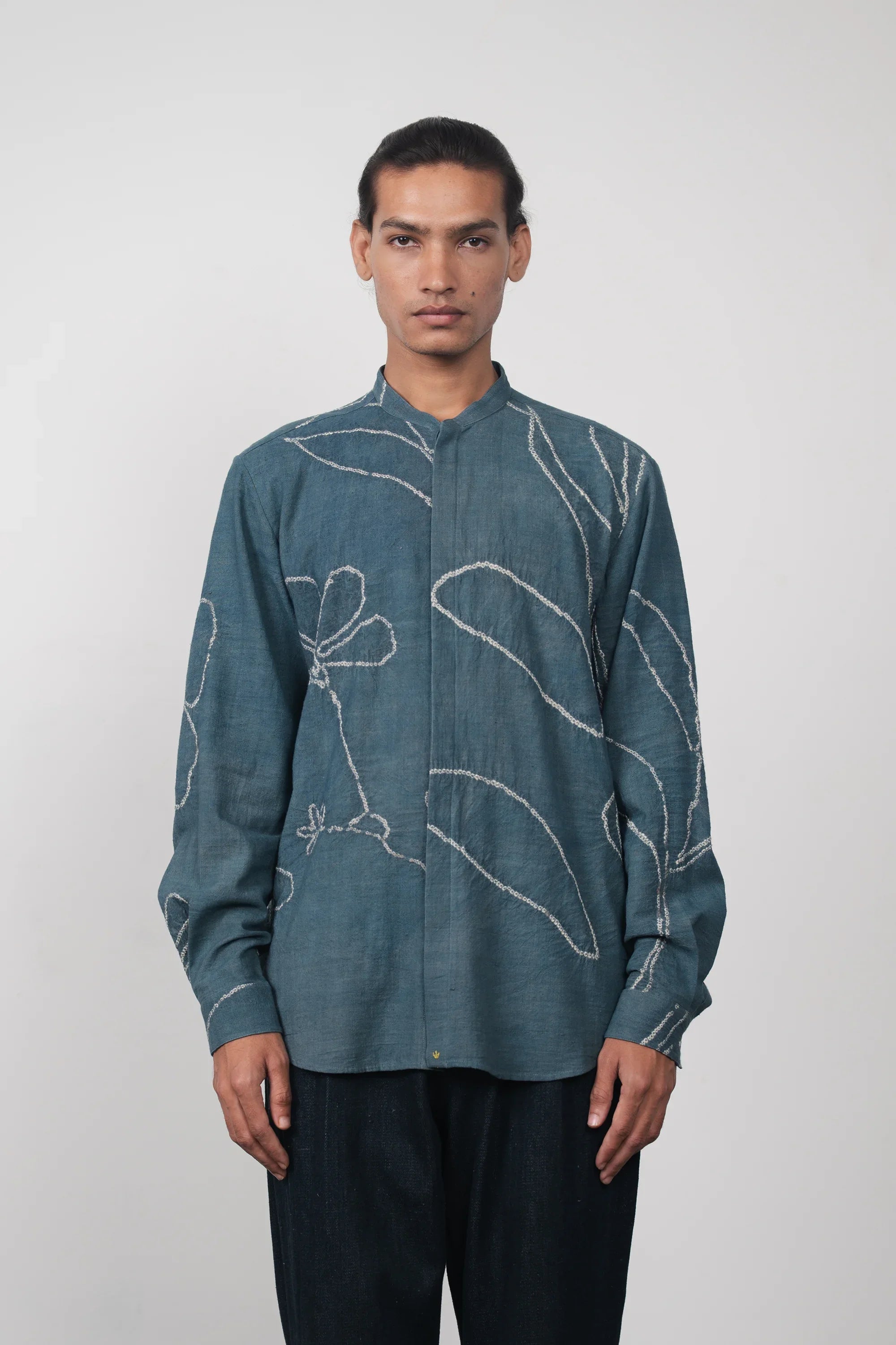 A man wearing ash indigo bandhani shirt