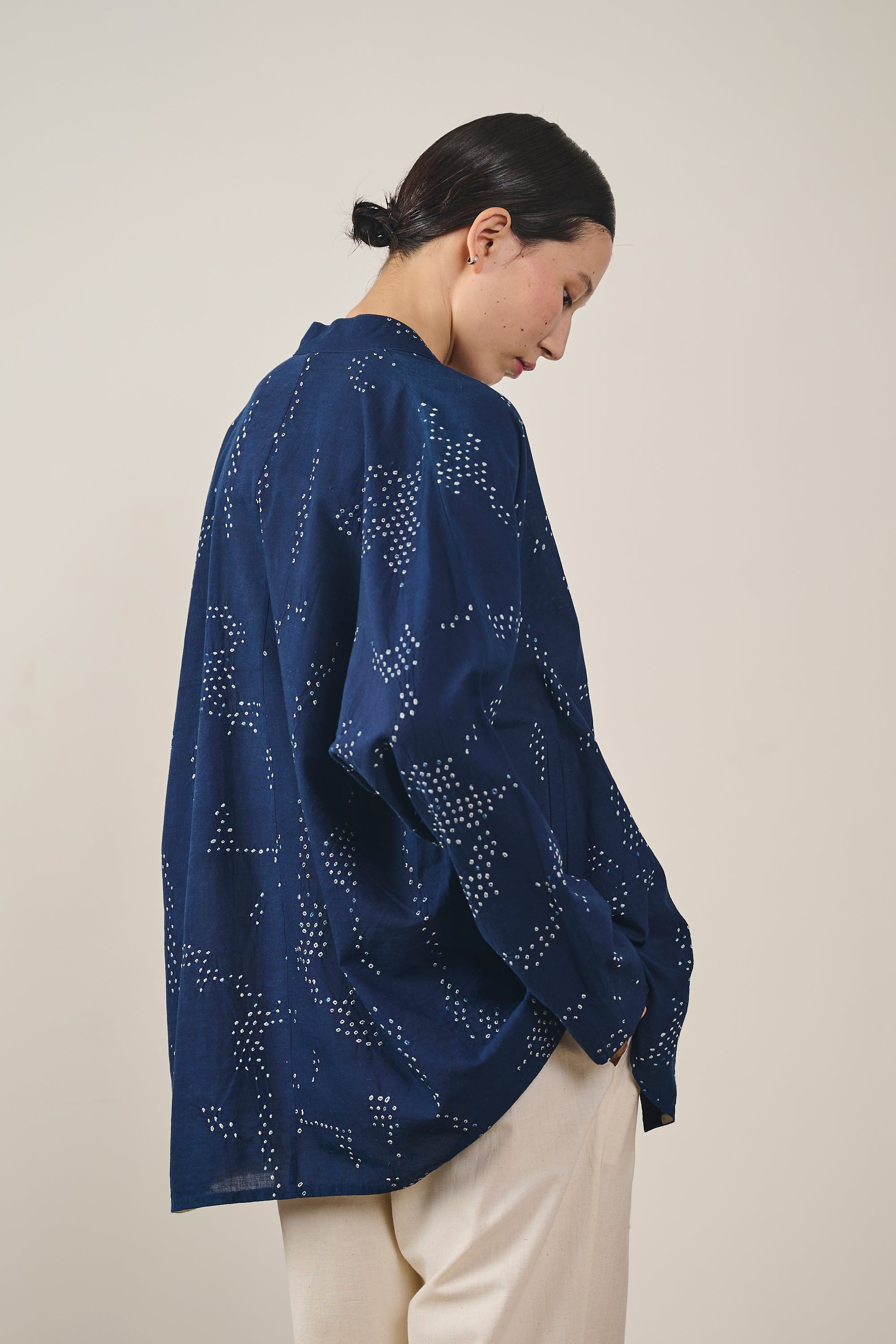 A woman wearing indigo shirt