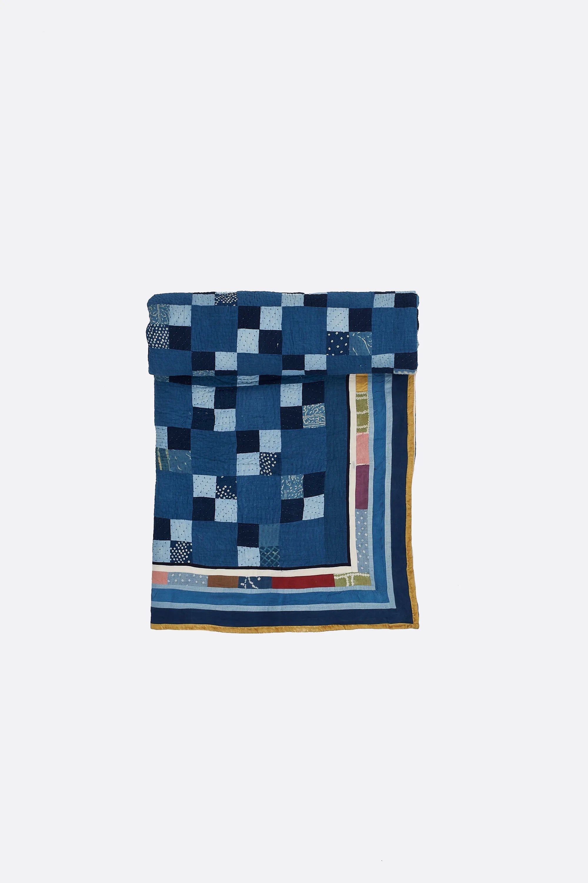 Colorful patterned fabric roll on a white background