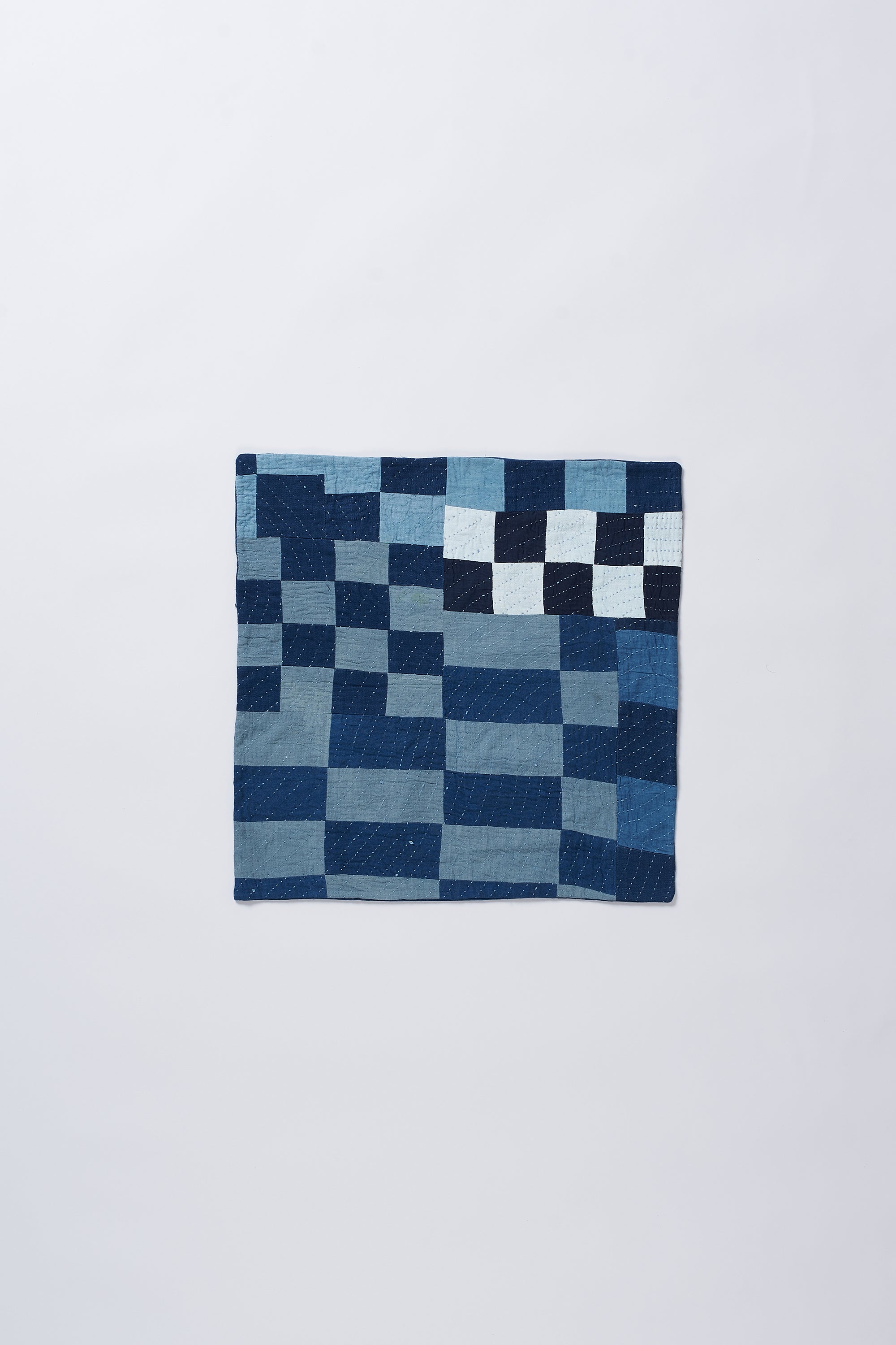 Patchwork indigo cushion