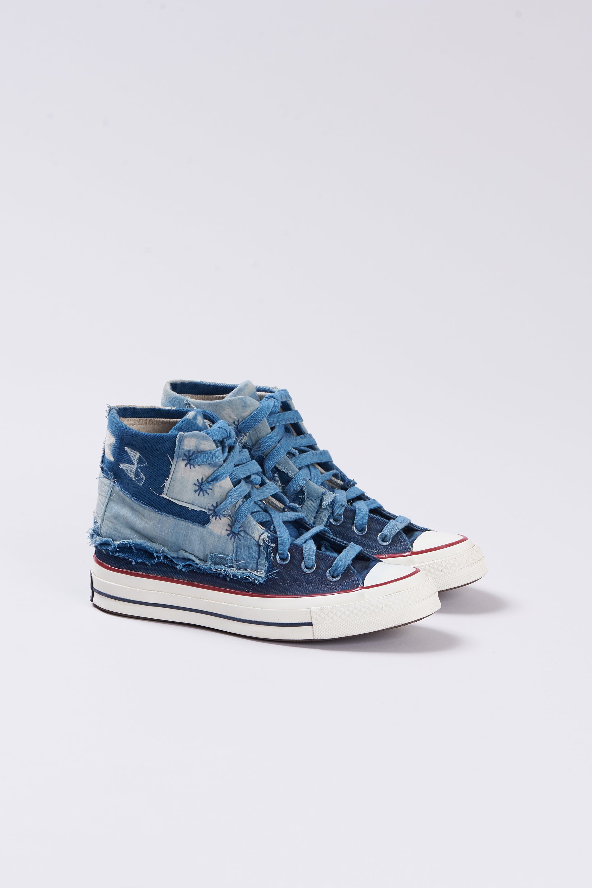 Blue high-top sneakers with patchwork