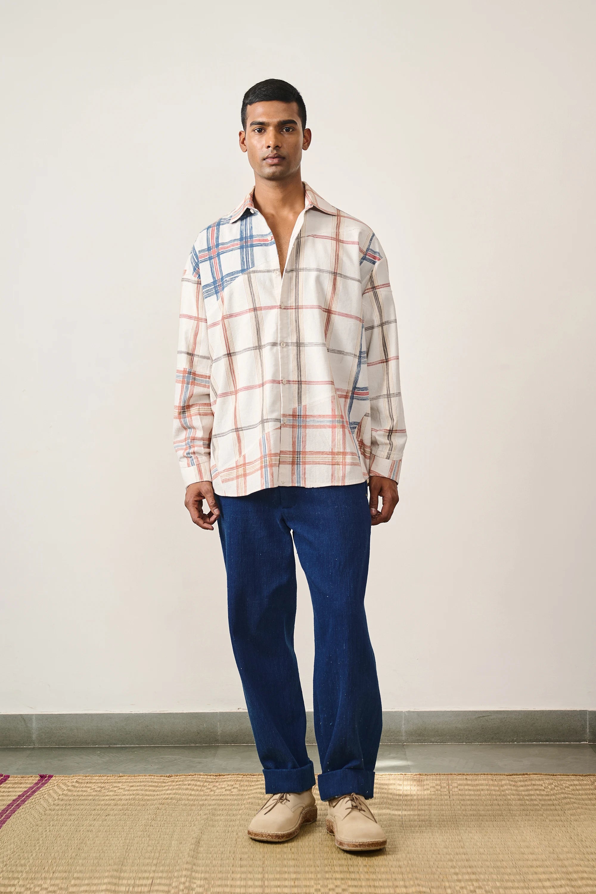 A man wearing multi colour cotton shirt