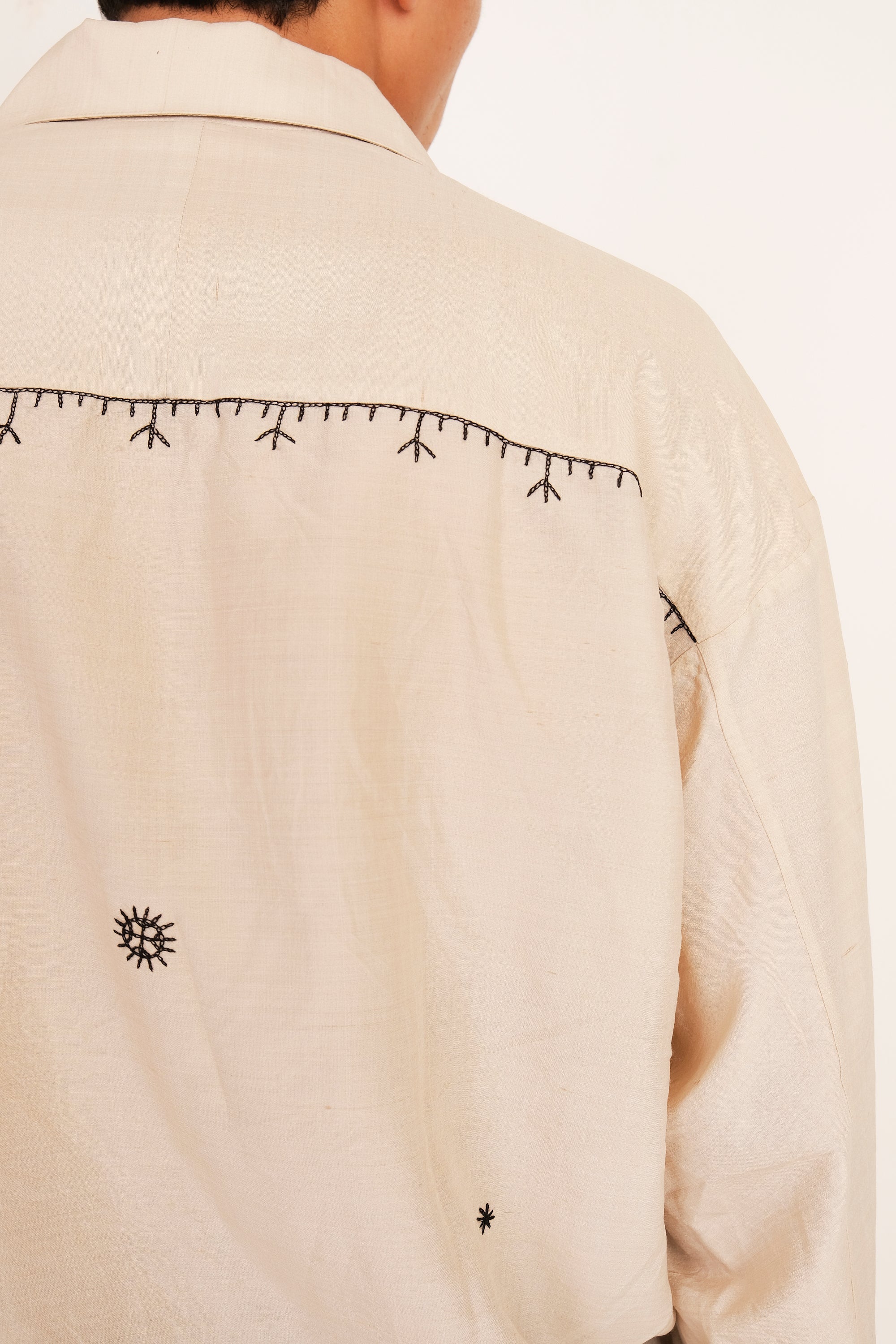 Ecru shirt with black embroidered