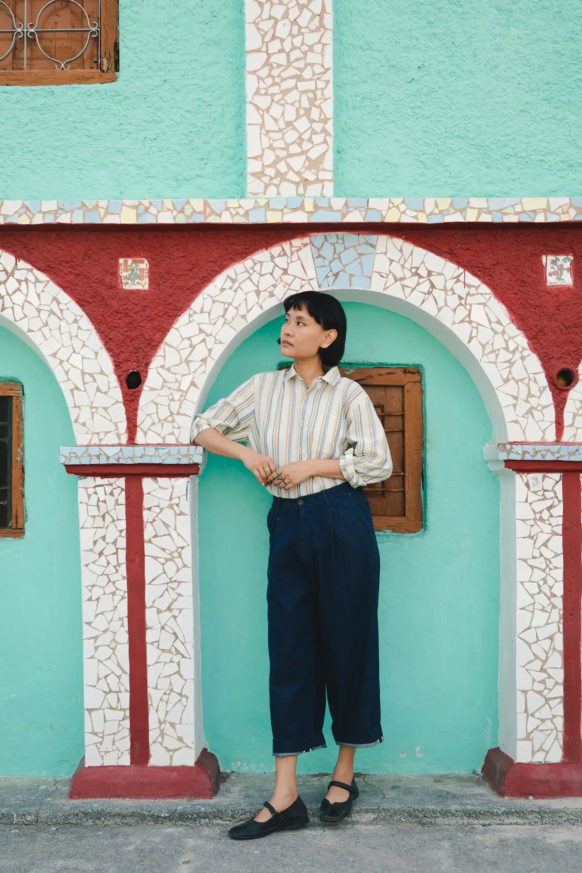 A woman wearing indigo denim pant