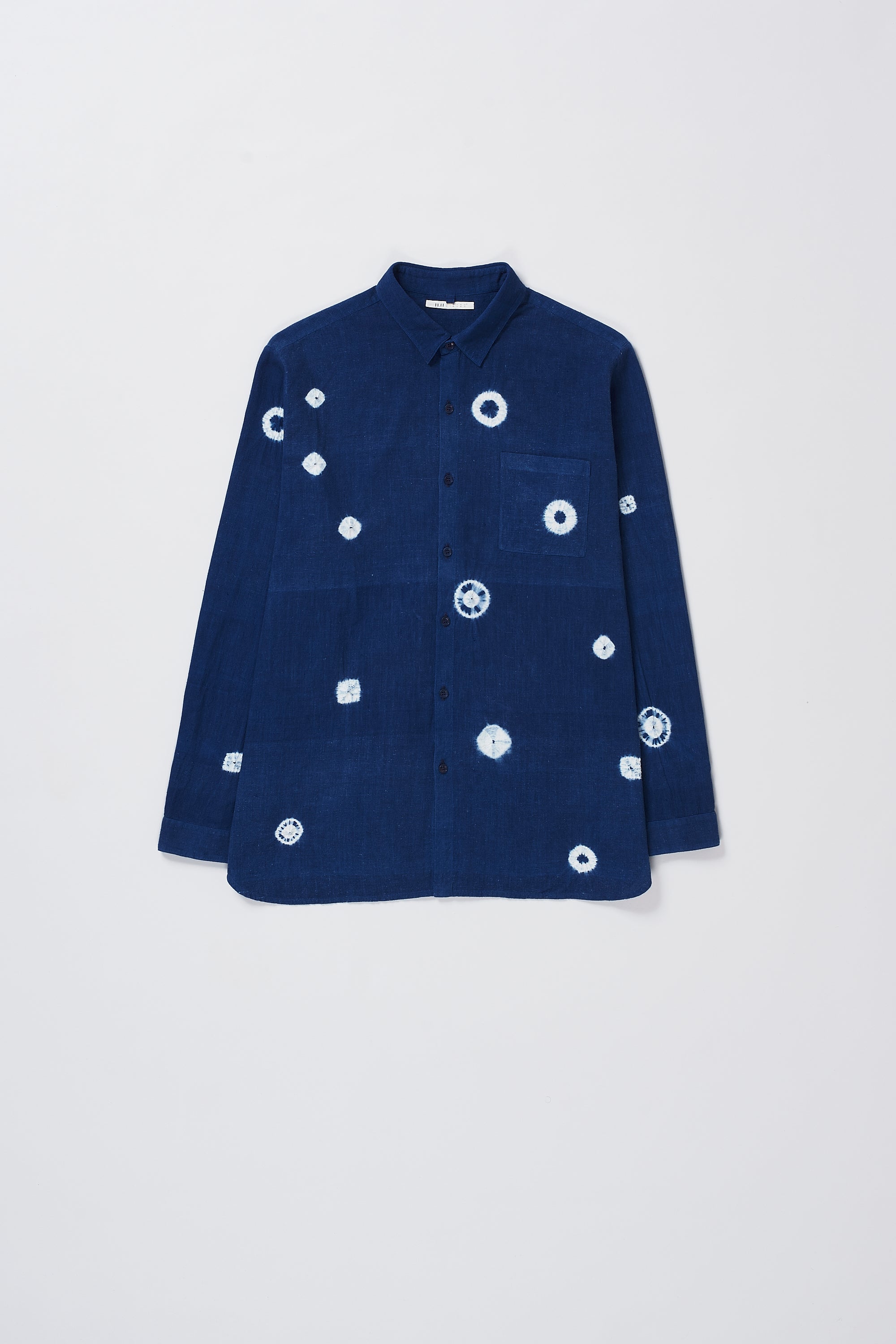 Front image of a medium indigo shirt