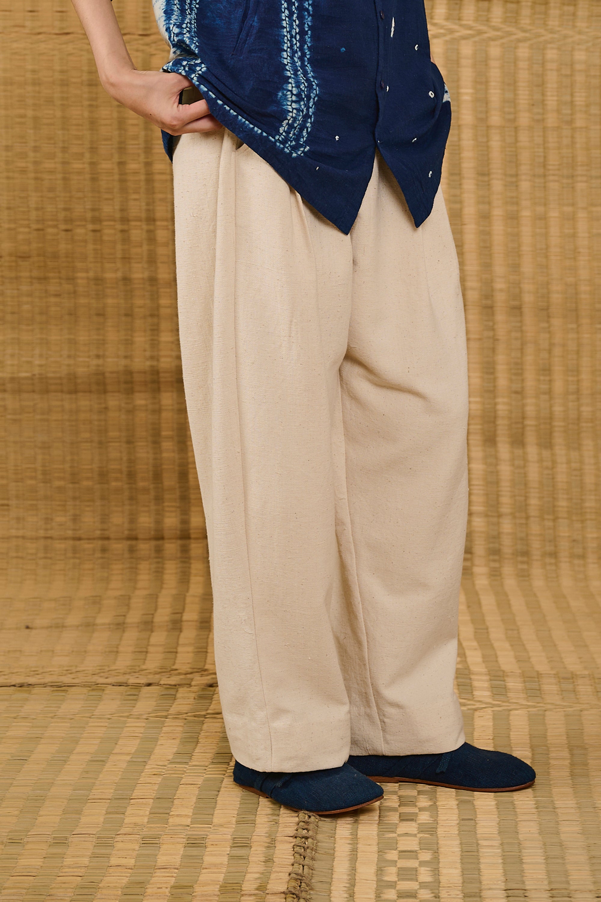 A woman wearing ecru cotton pant
