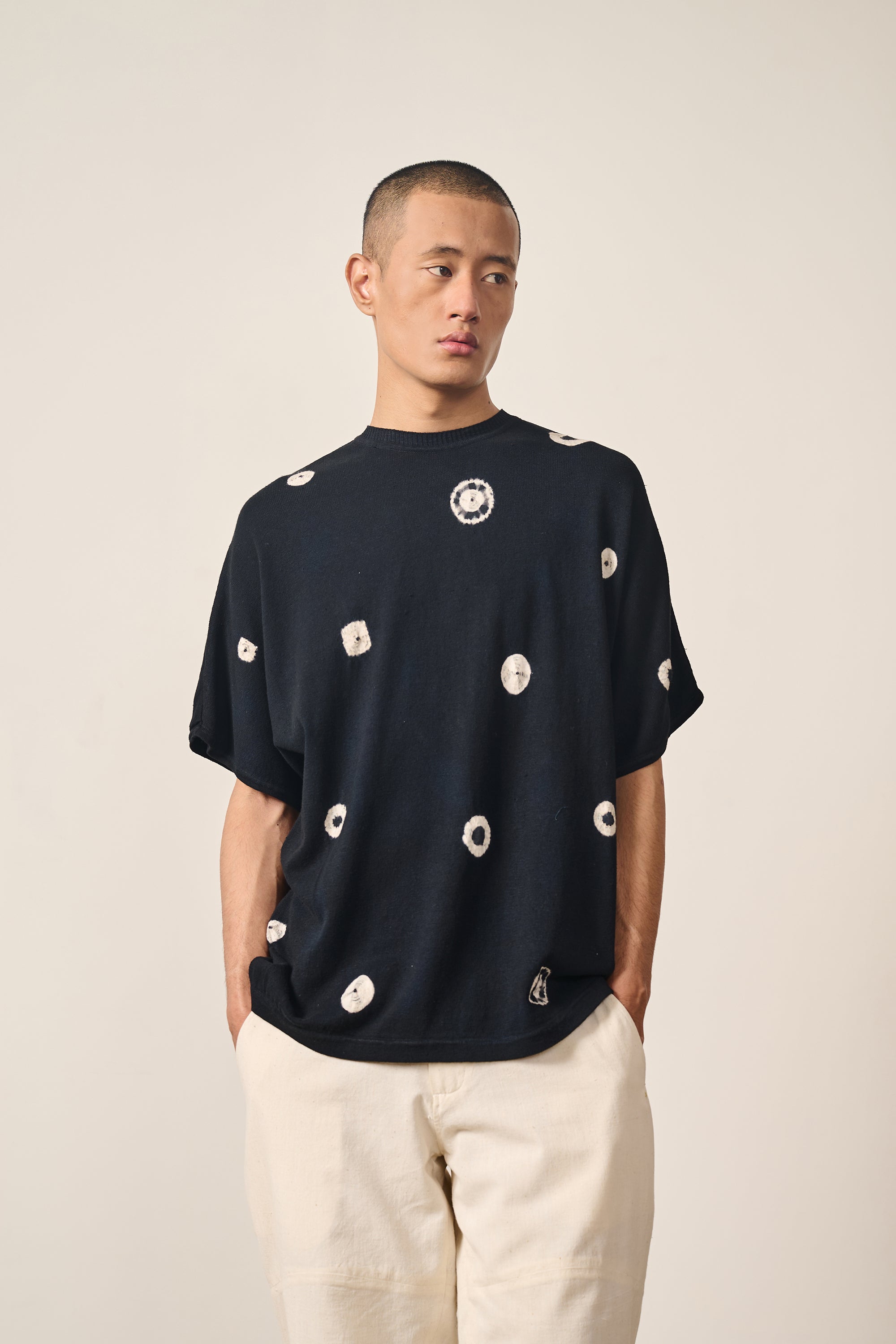 A man wearing black cotton t-shirt