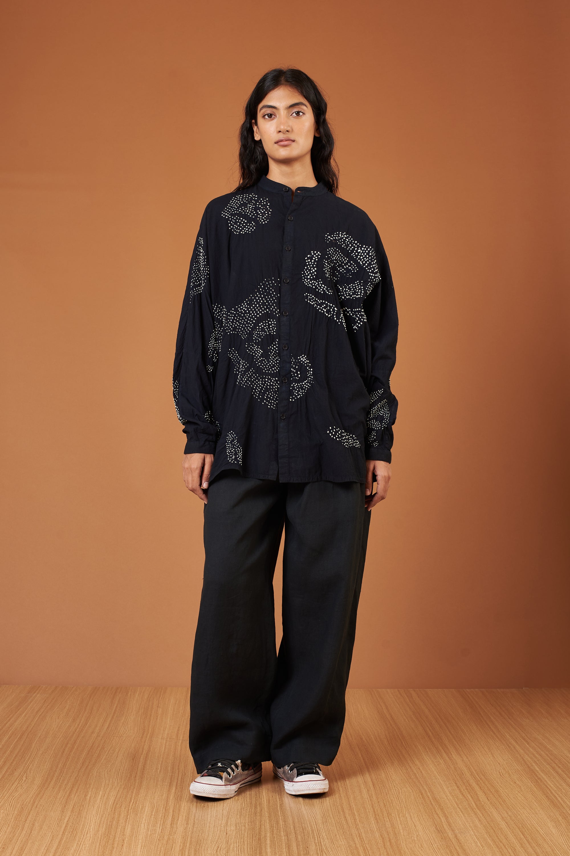 A woman wearing black shirt
