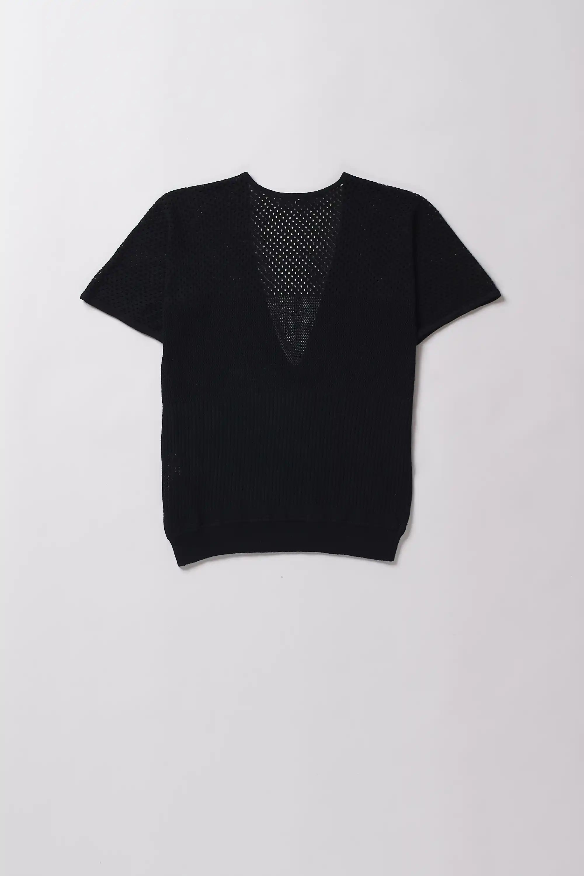 Black t-shirt with knitted patterns on a grey background