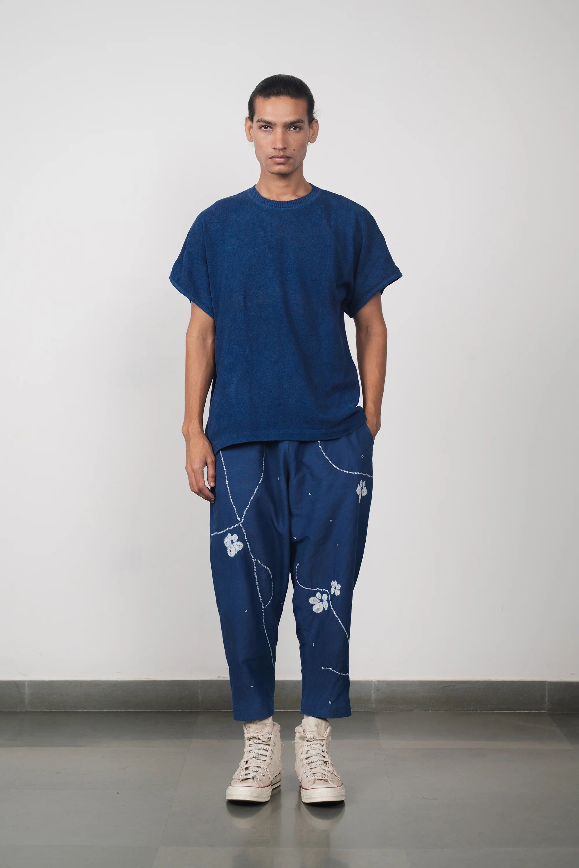 A man wearing medium indigo cotton t-shirt