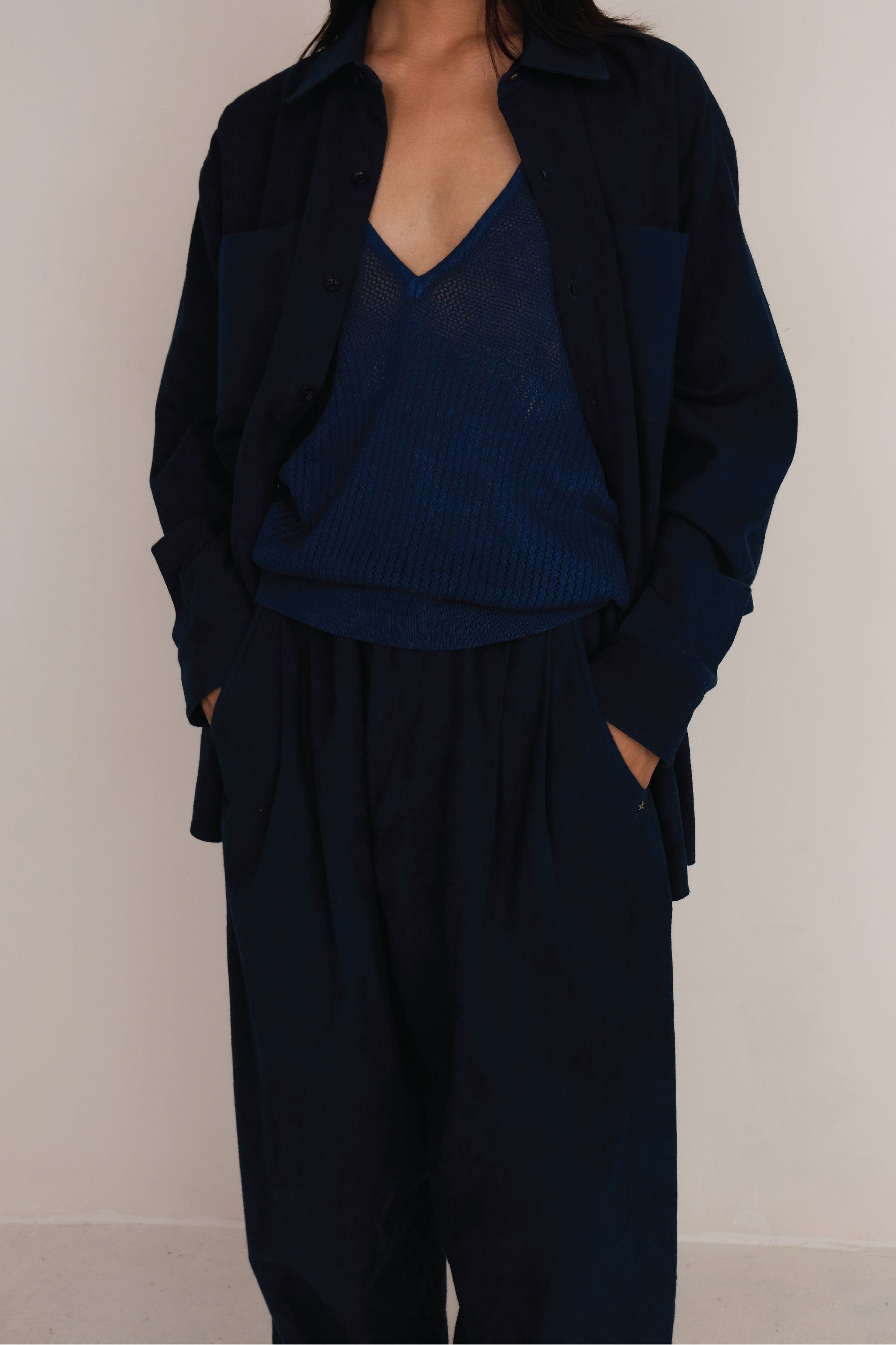 Close-up of a woman wearing indigo cotton t-shirt