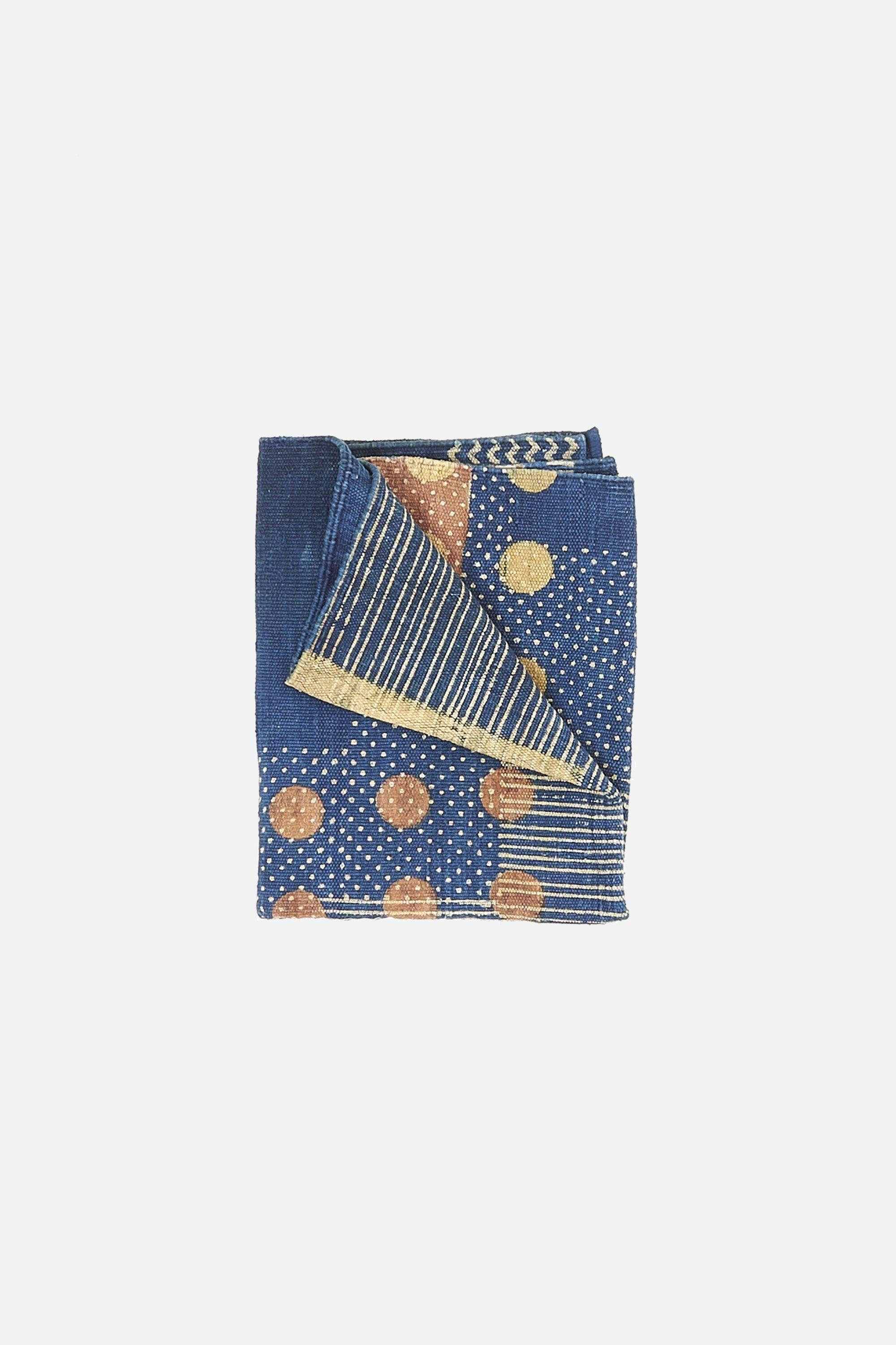 Folded indigo multi colour quilt