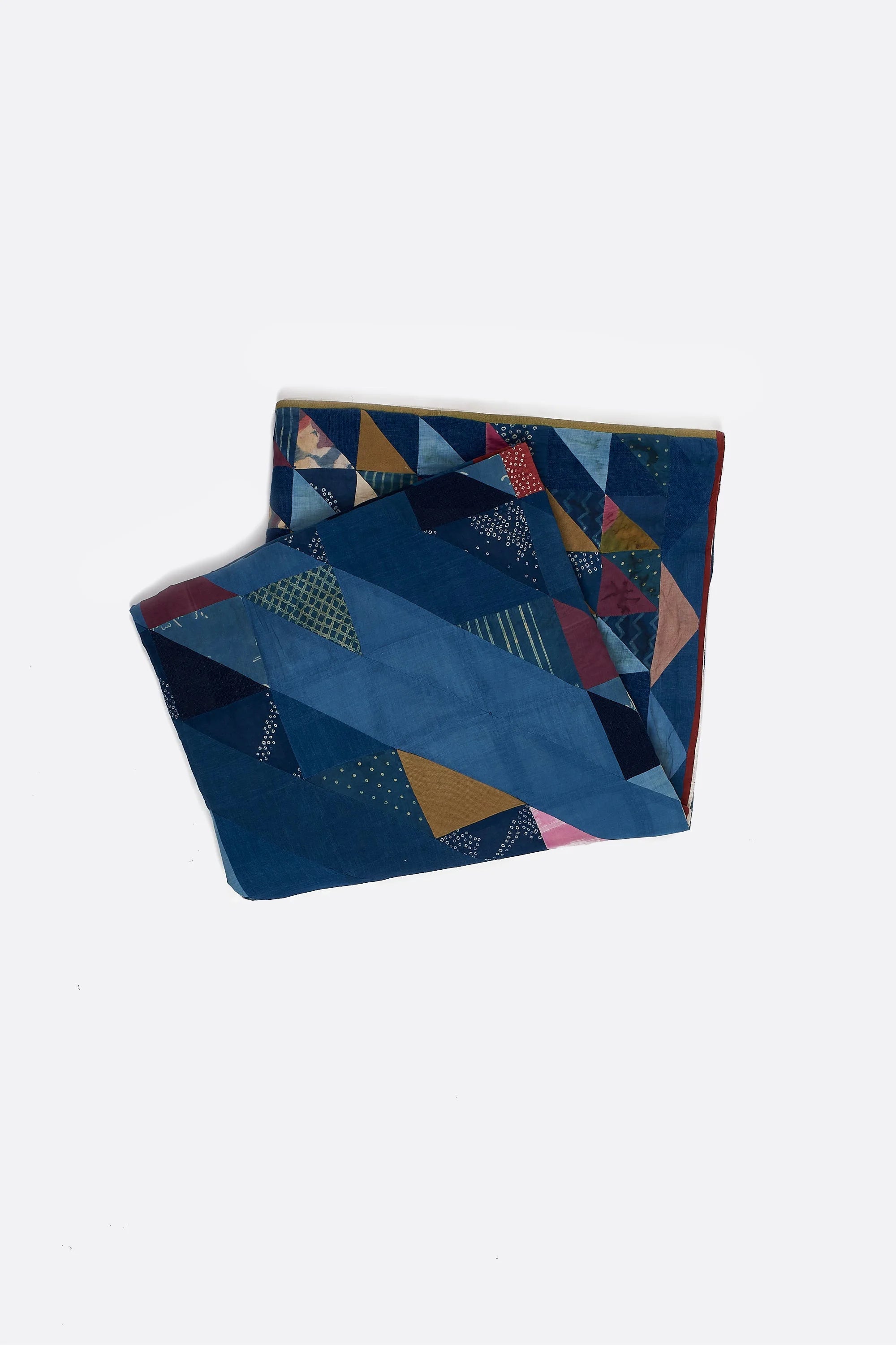 Colorful geometric-patterned fabric on a white background