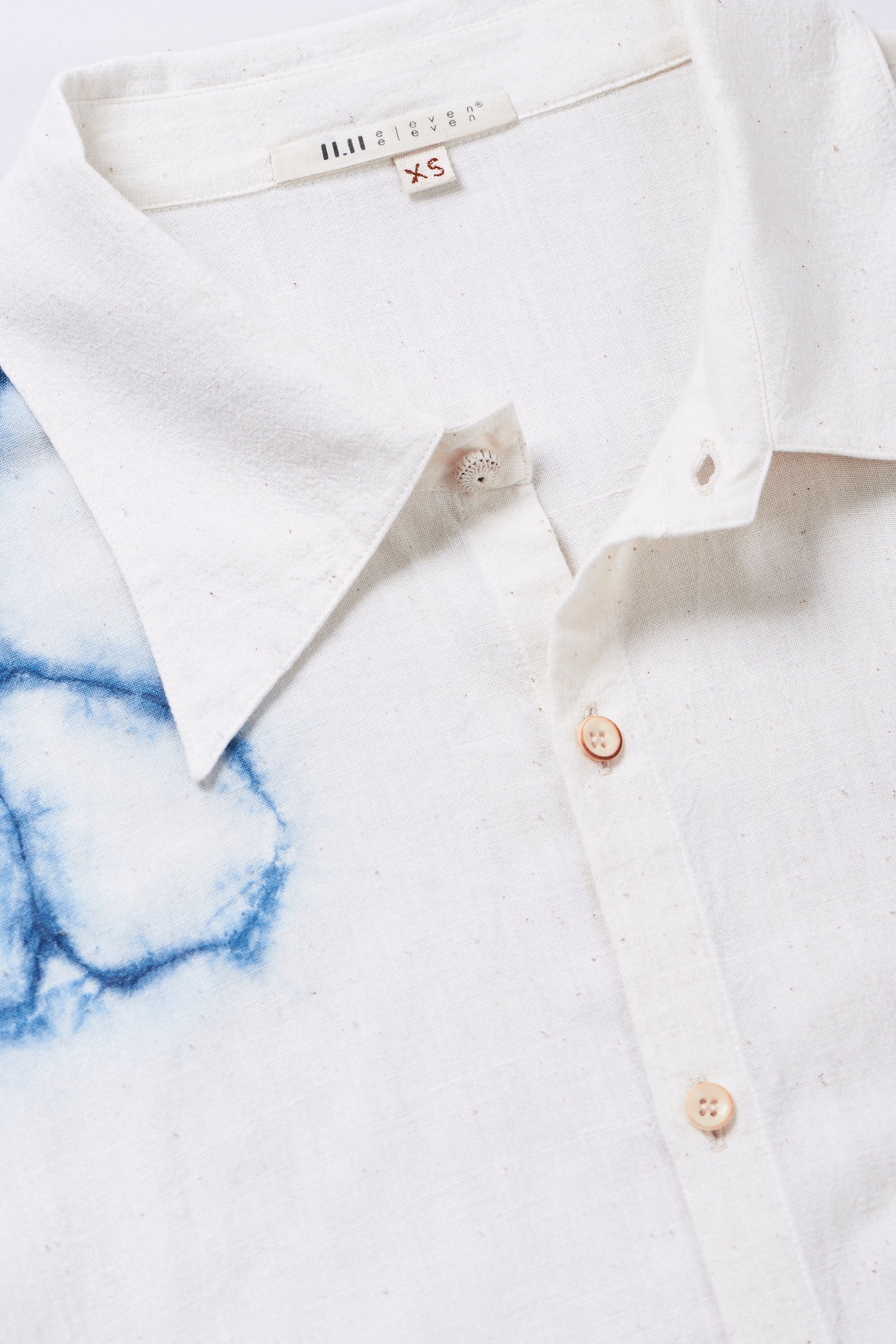 Fabric close-up with cotton and buttons
