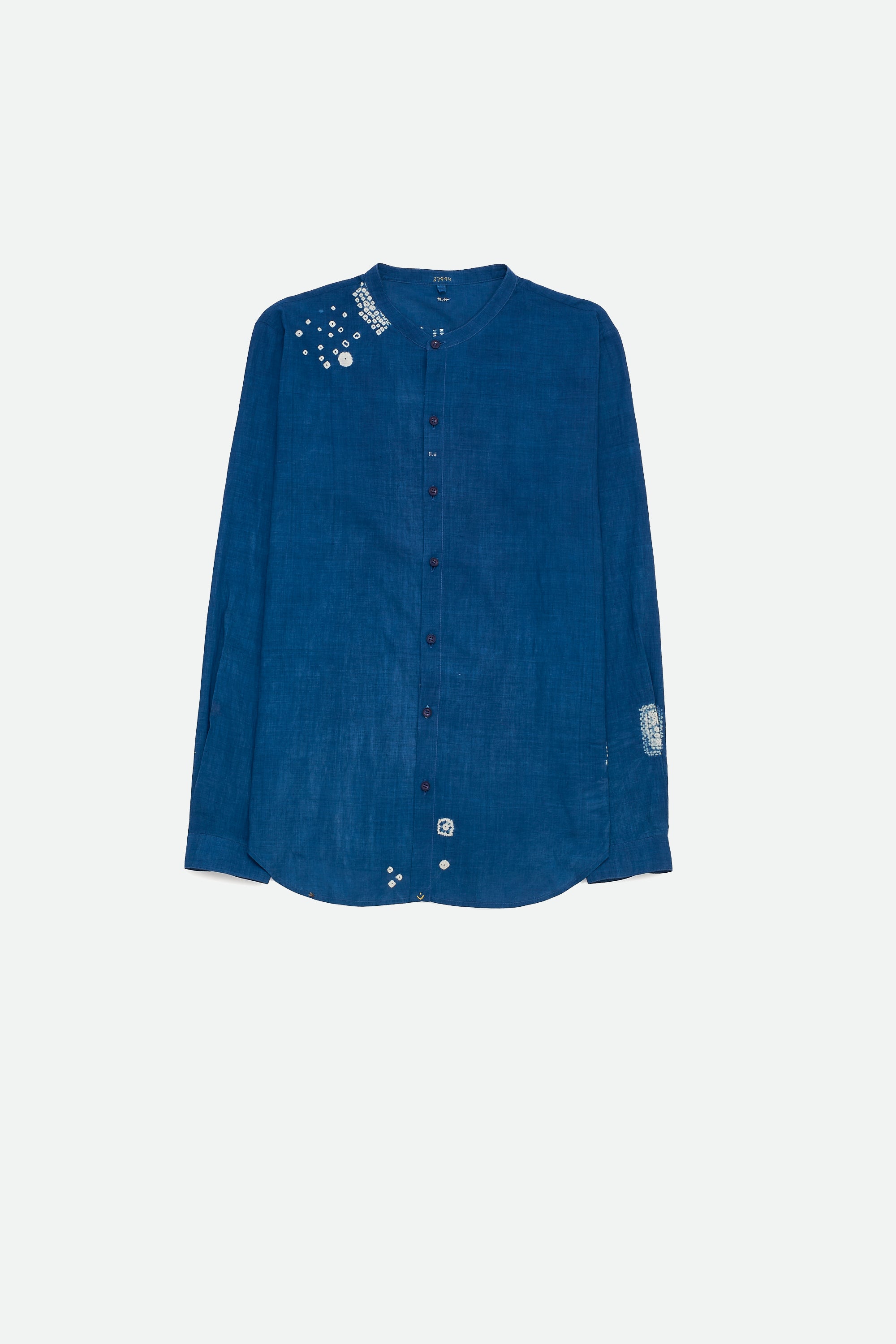 Front image of indigo shirt with bandhani and shibori work
