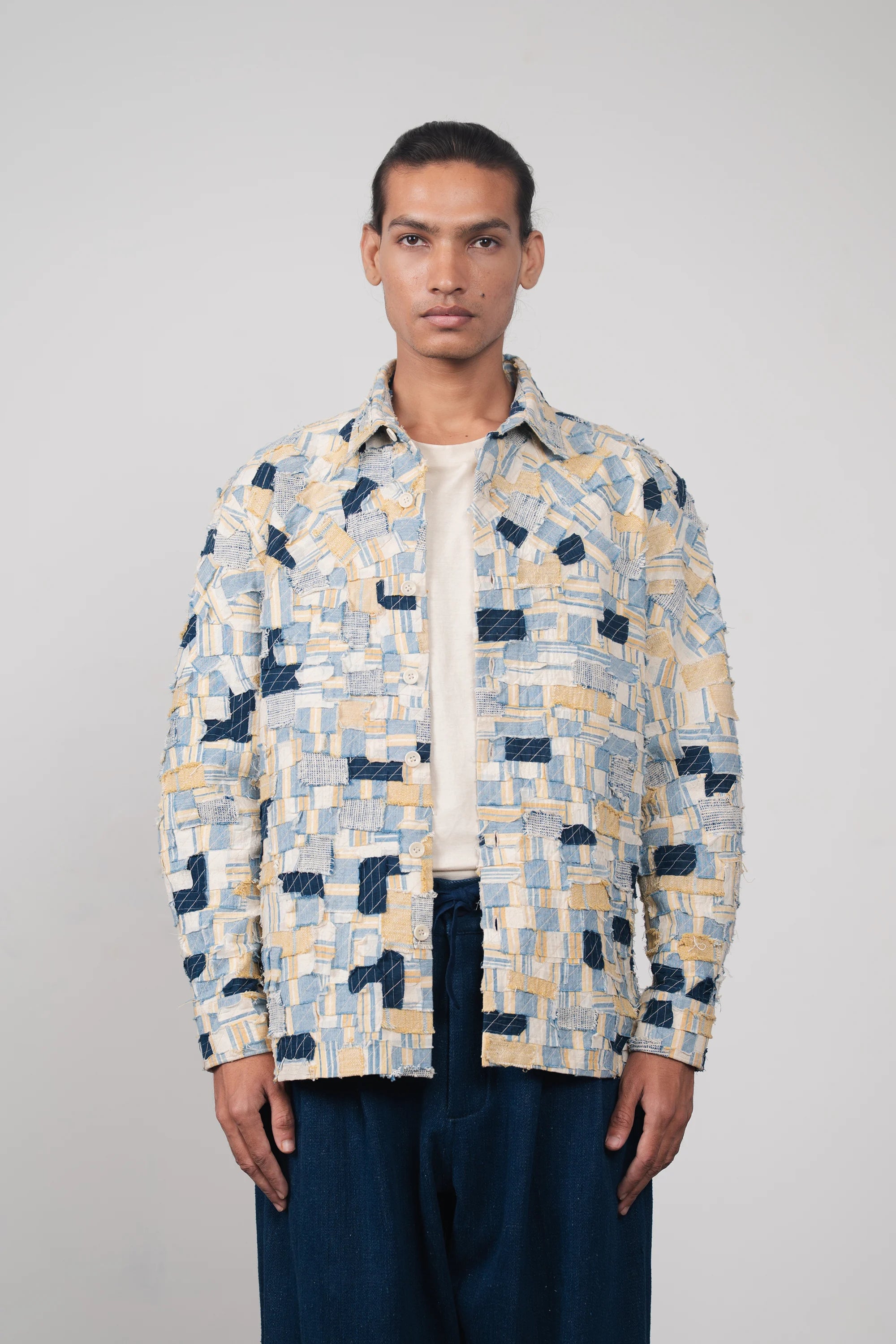 A man wearing multi colour cotton shirt