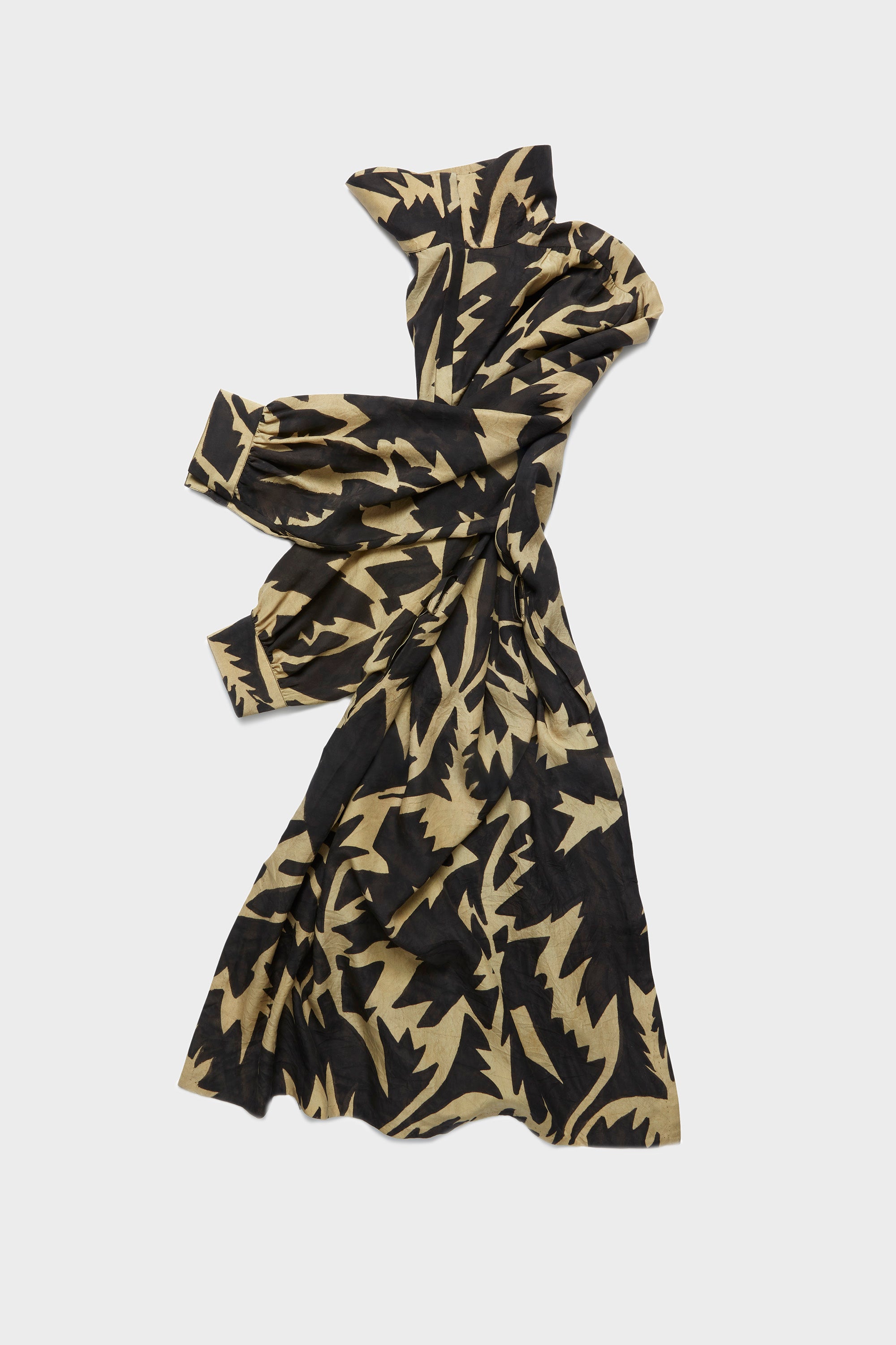 Screen printed silk dress on a light grey back ground
