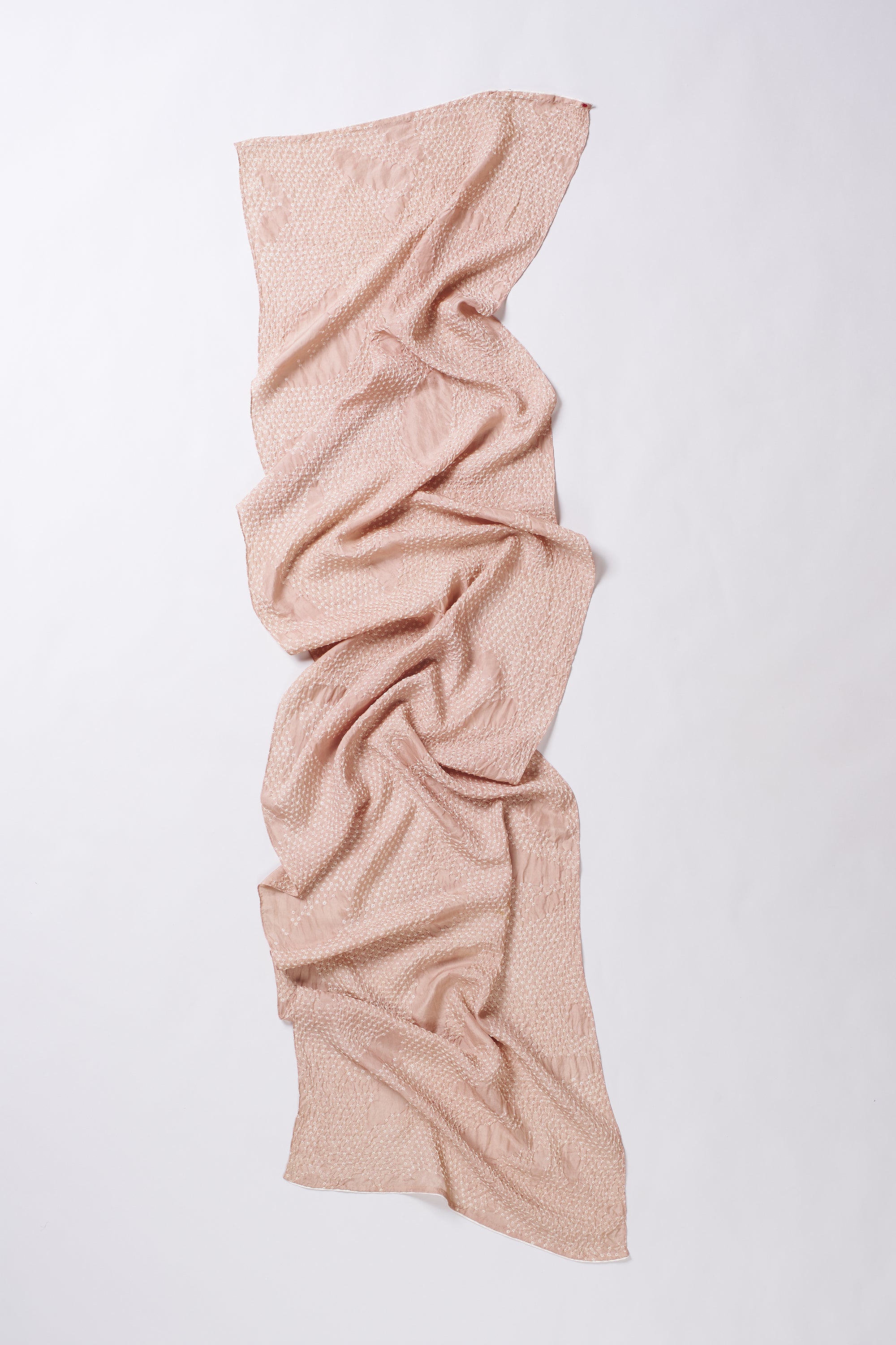 Pink knitted scarf