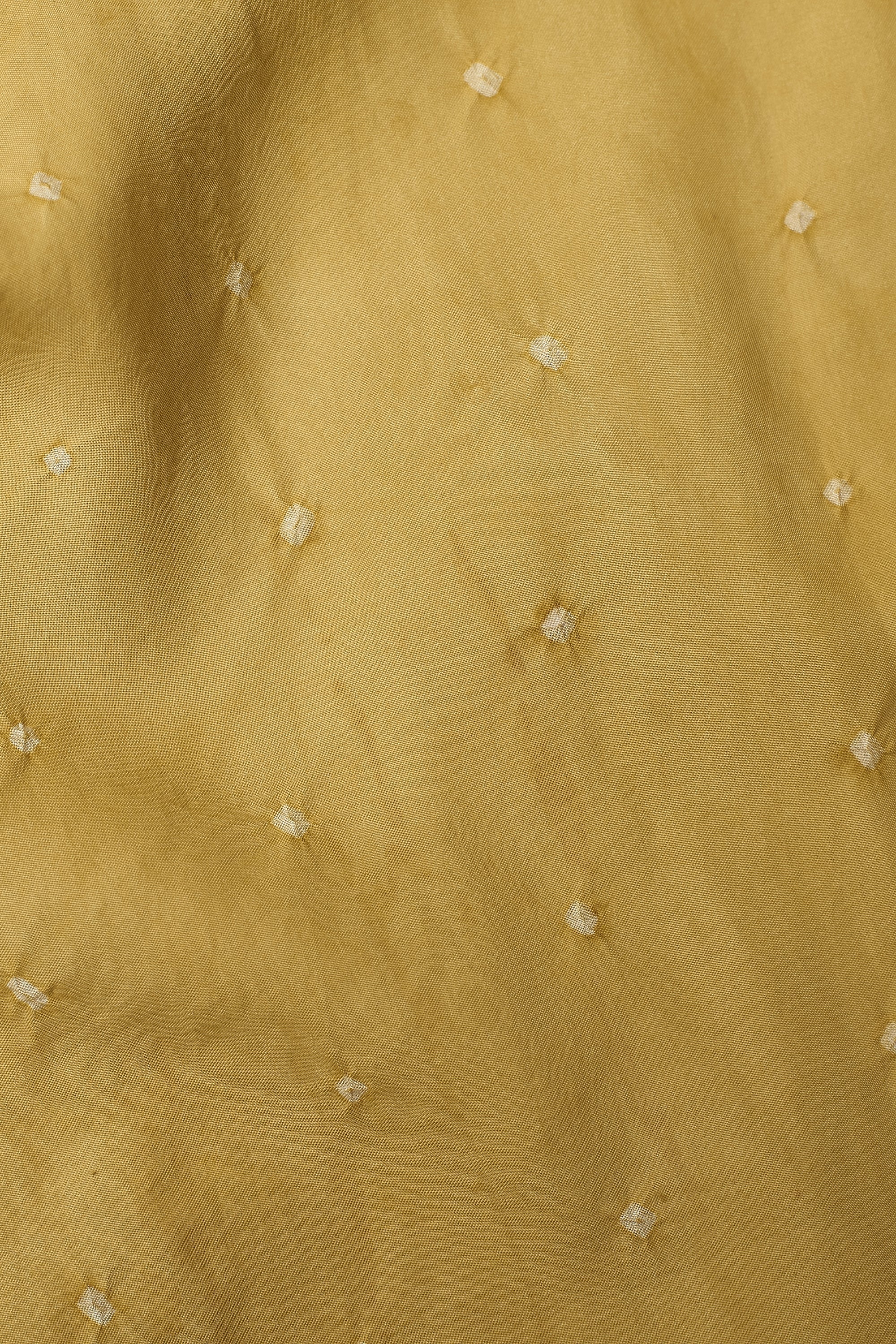 Close-up of a textured beige fabric