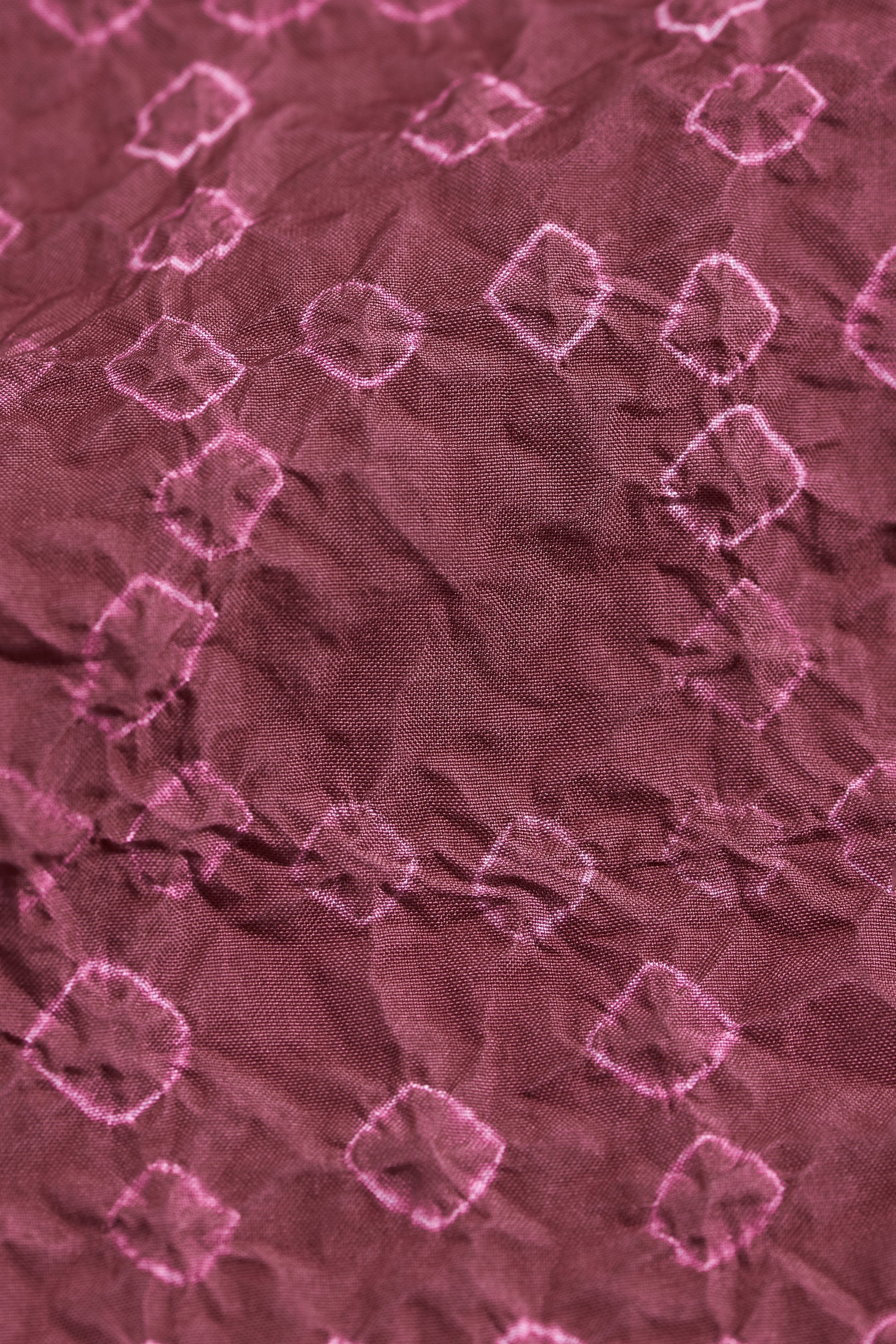 Close-up of a textured purple fabric
