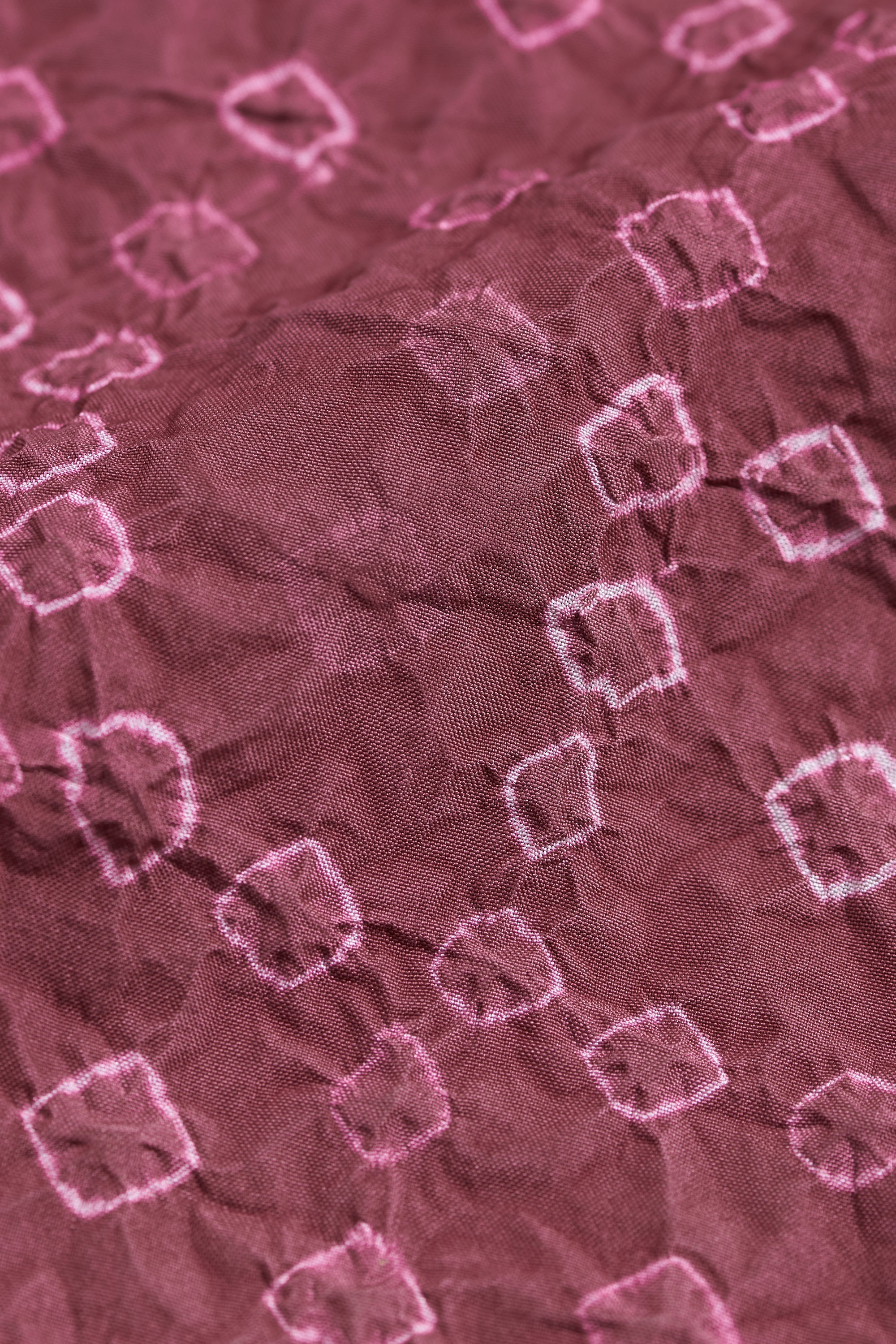 Close-up of a textured purple fabric
