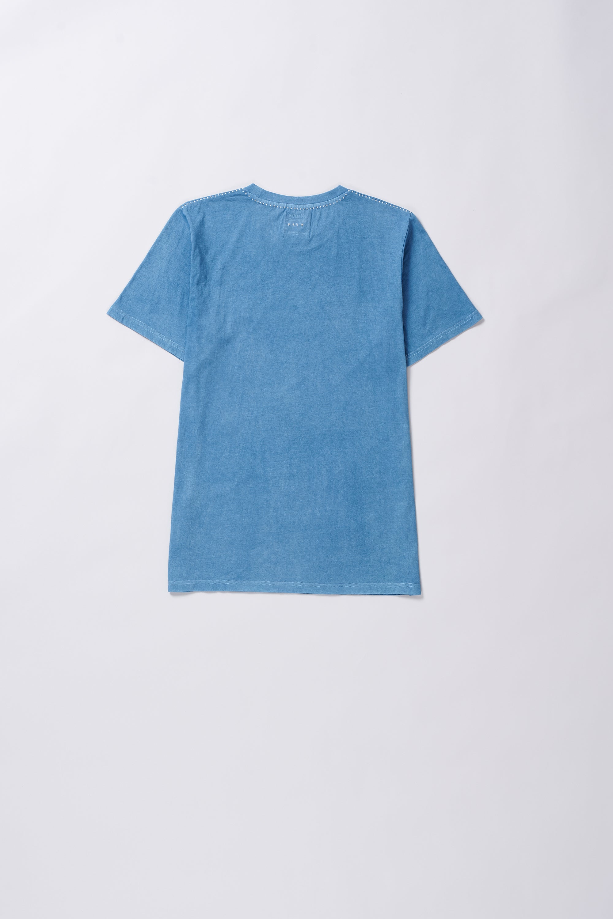 Back image of a light indigo cotton shirt